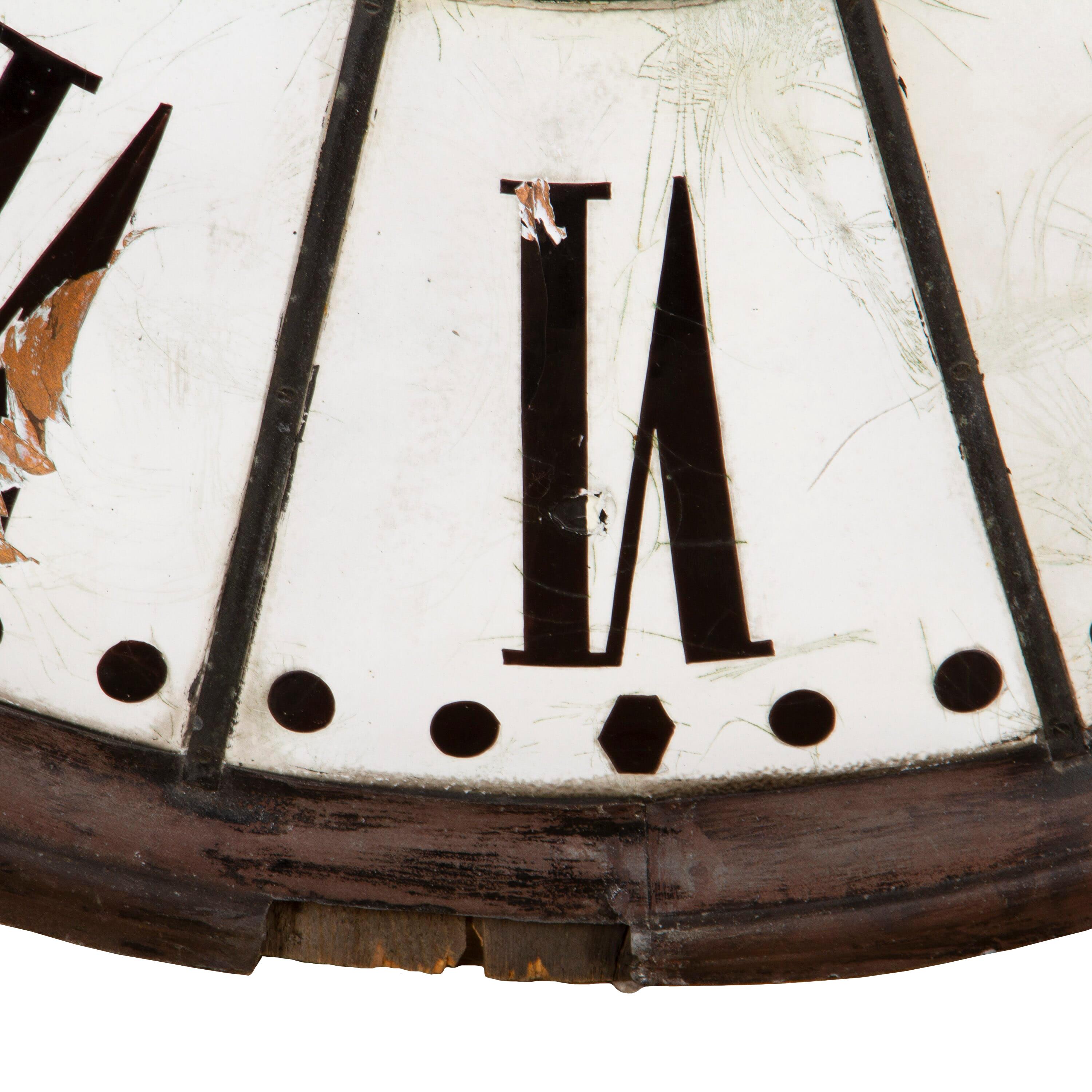 Fantastic 19th century French clock face. This large clock face retains its original zinc frame and handles. 
It has a great aged worn patina which adds to its provincial charm. Each roman numeral has been set in enamel for durability and