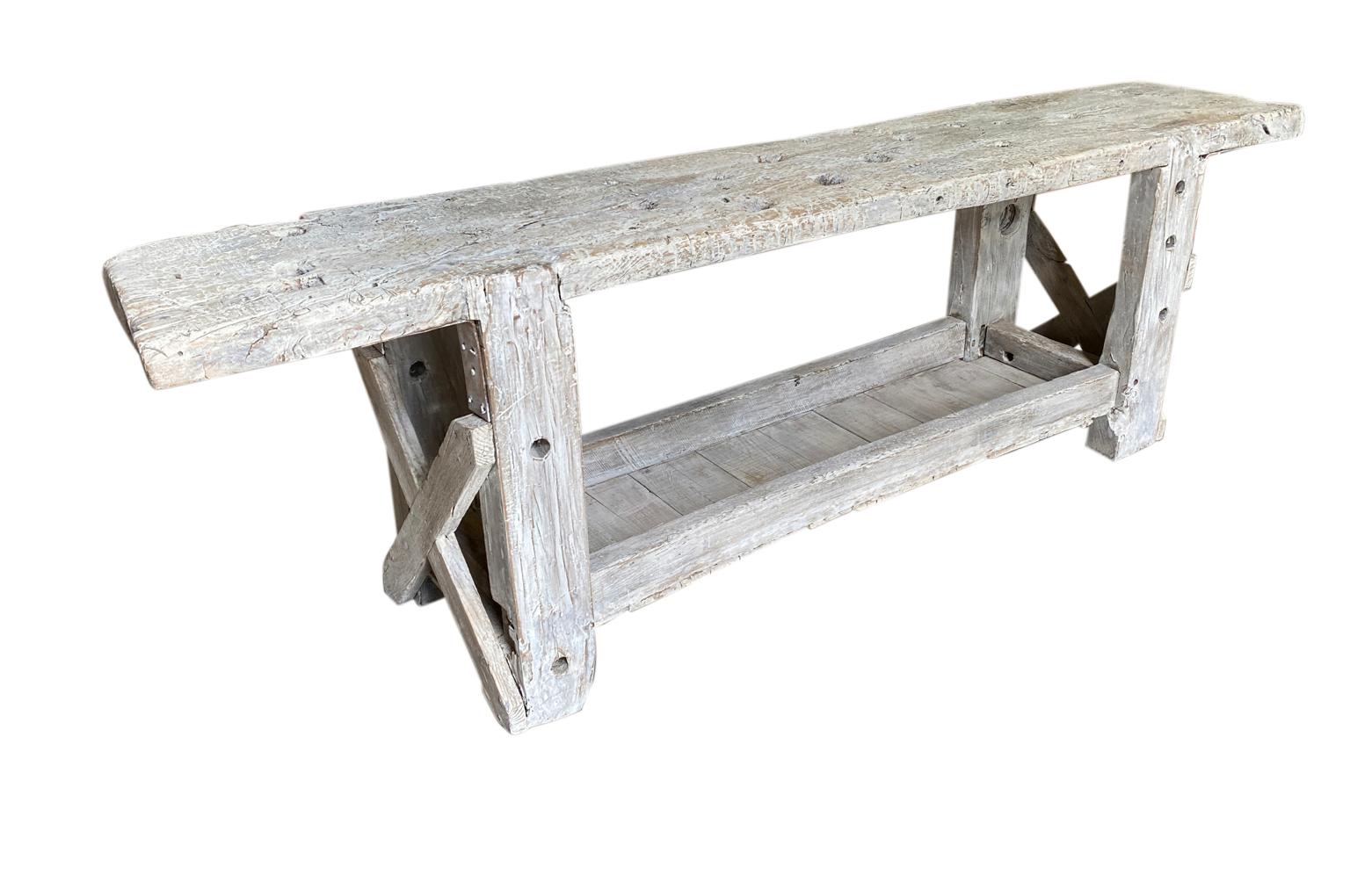 A fabulous 19th century grand scale Etabli - work table console from the Provence region of France. Soundly constructed from pine with a very thick top board. A perfect console for any modern or rustic environment.
