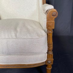 French 19th Century Exquisitely Carved Walnut Bergere with New Upholstery