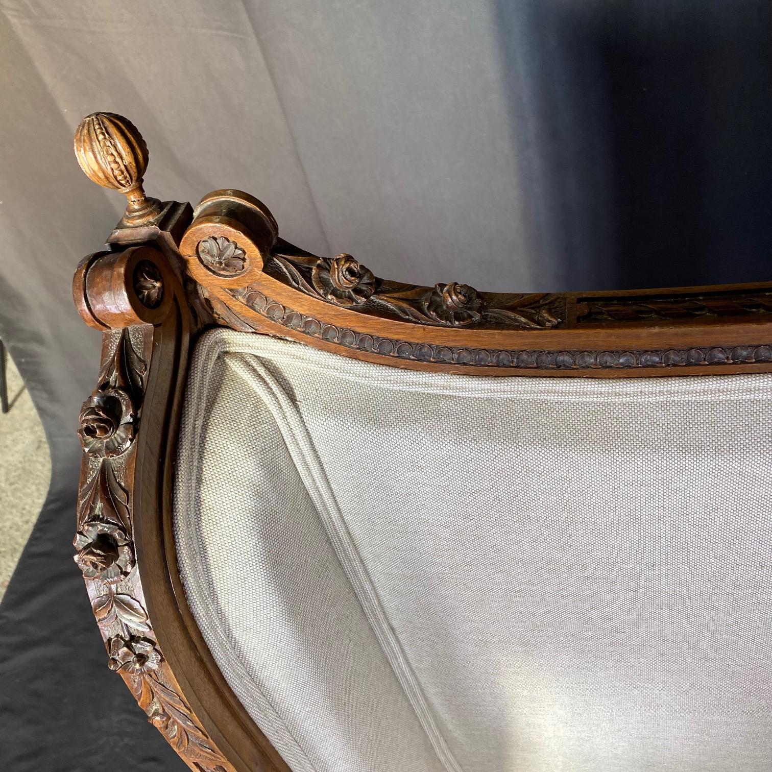 French 19th Century Exquisitely Carved Walnut Bergere with New Upholstery In Good Condition For Sale In Hopewell, NJ
