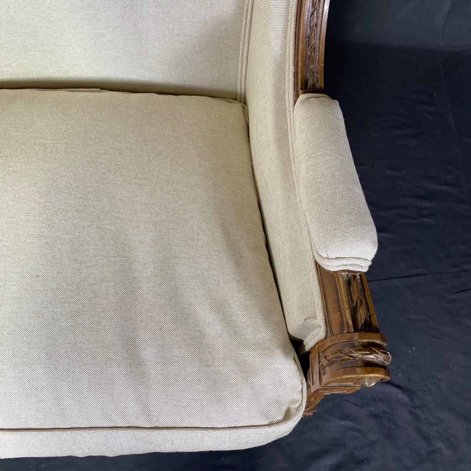 French 19th Century Exquisitely Carved Walnut Bergere with New Upholstery For Sale 4