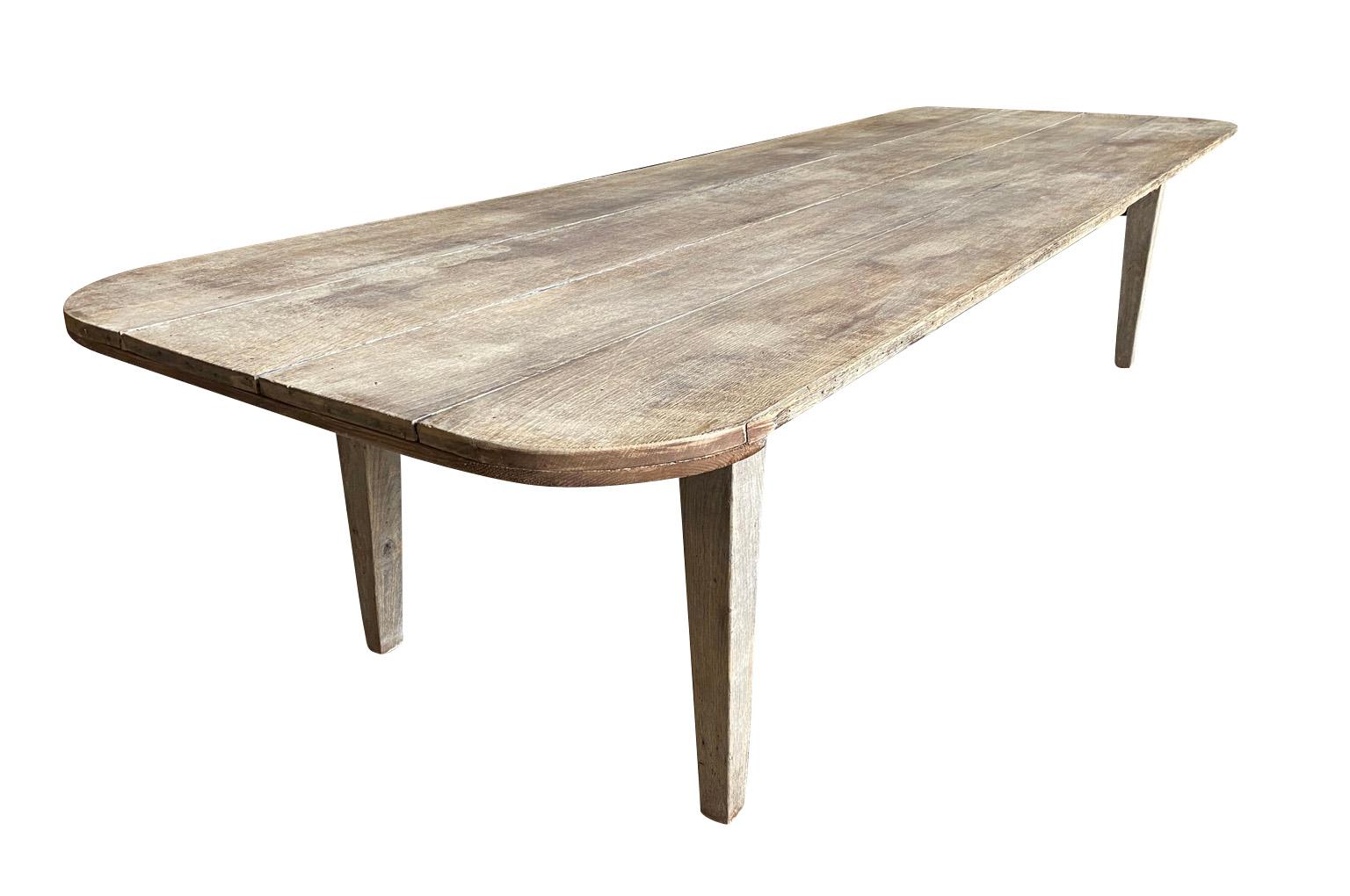 A very beautiful 19th century Farm Table from the Provence region of France. Soundly constructed from naturally washed oak. Very sturdy. A wonderful large scale - perfect for large family gatherings.