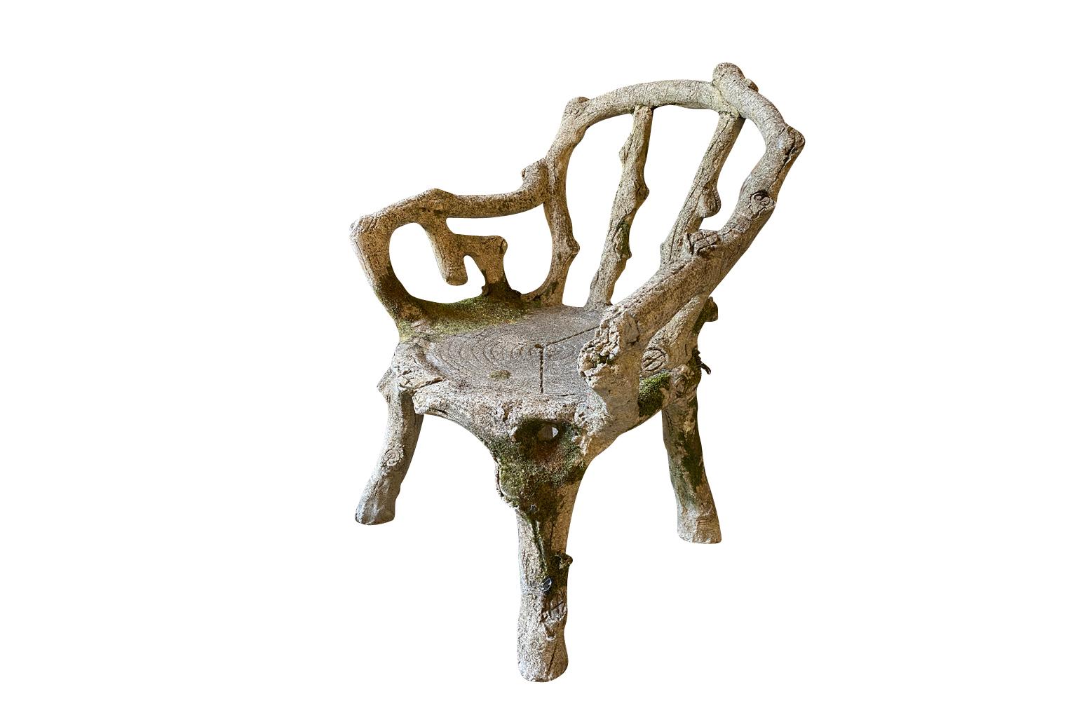 A very charming late 19th century Garden Chair from the Provence region of France. Beautifully crafted from concrete with wonderful detailing. The seat height is 17 1/8