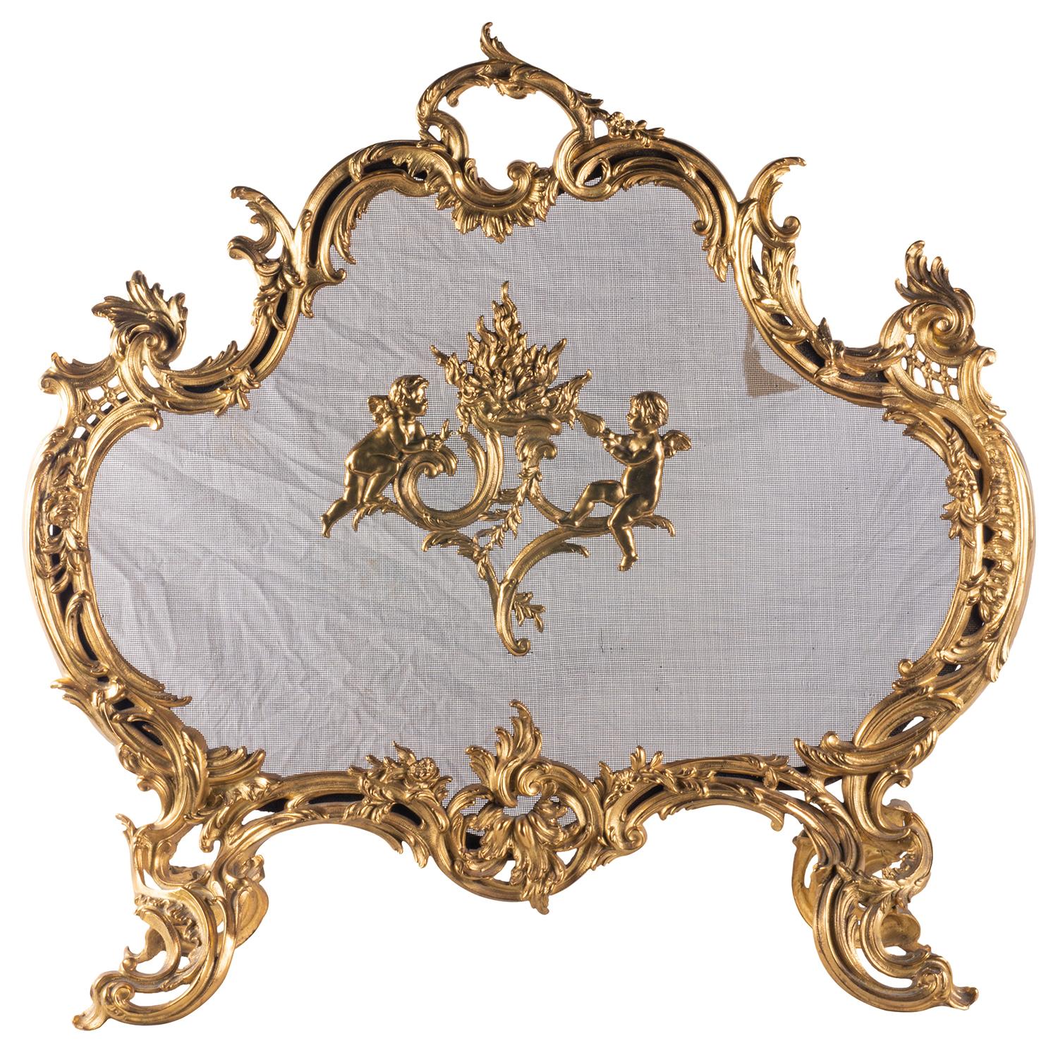A very good quality late 19th century French gilded ormolu, Louis XVI style Rococo influenced fire screen, having wonderful scrolling foliate decoration.
   