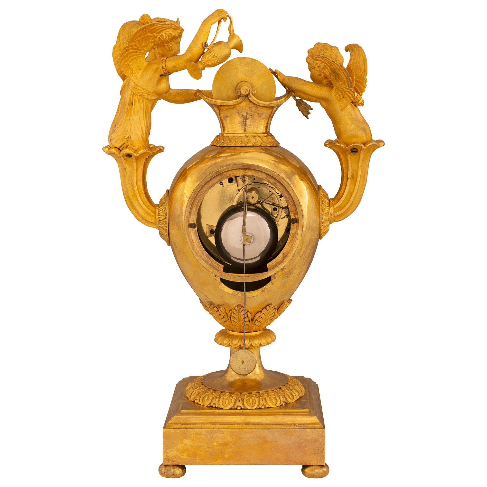 Horloge française du XIXe siècle en bronze doré du Premier Empire en vente 4
