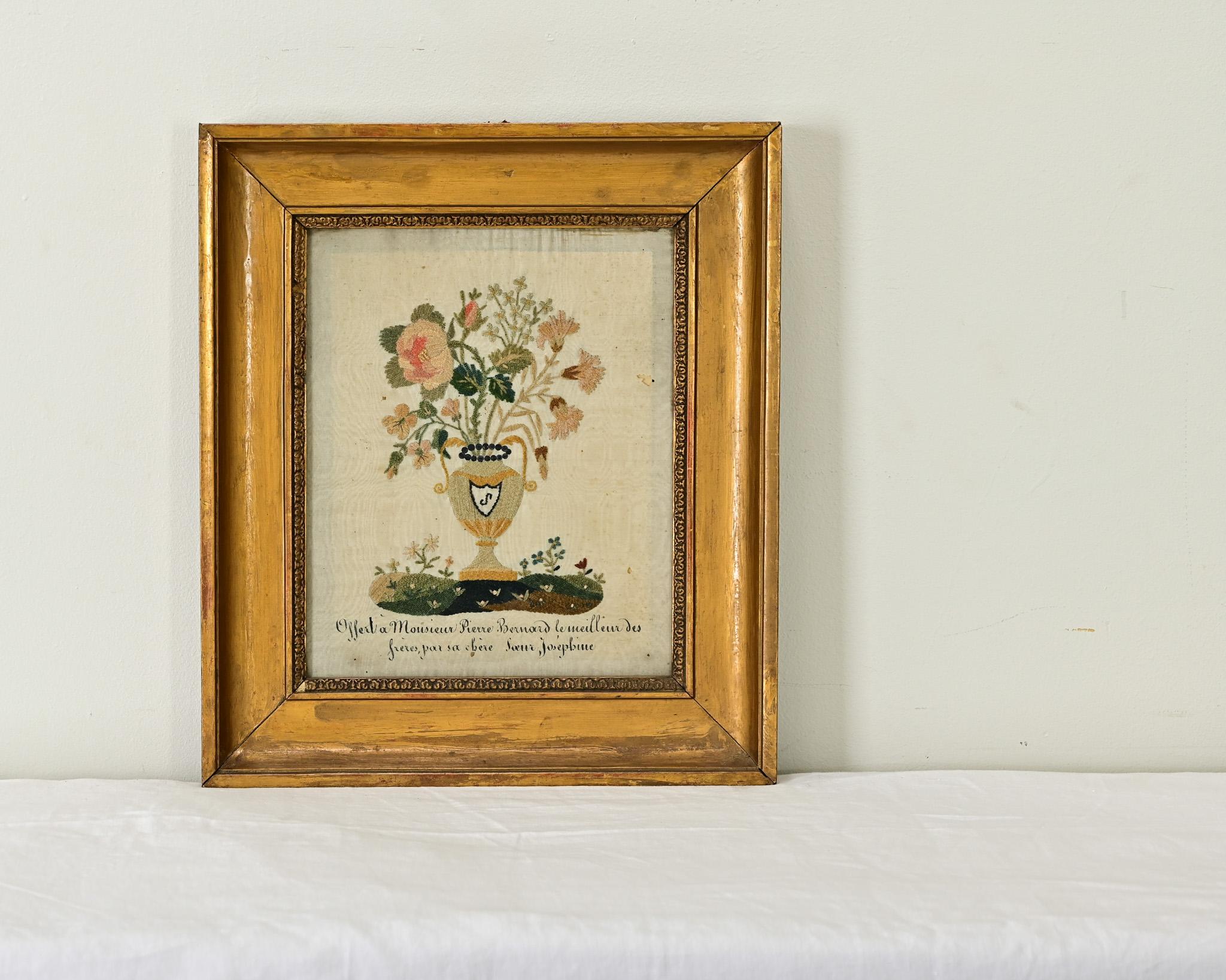 This delicate piece of embroidery on silk depicts flowers in an amphora, and according to the text at the bottom (in French) this touching gift was “Offered to Mr. Pierre Bernard, the best of brothers, by his dear sister Josephine.” Every loop of