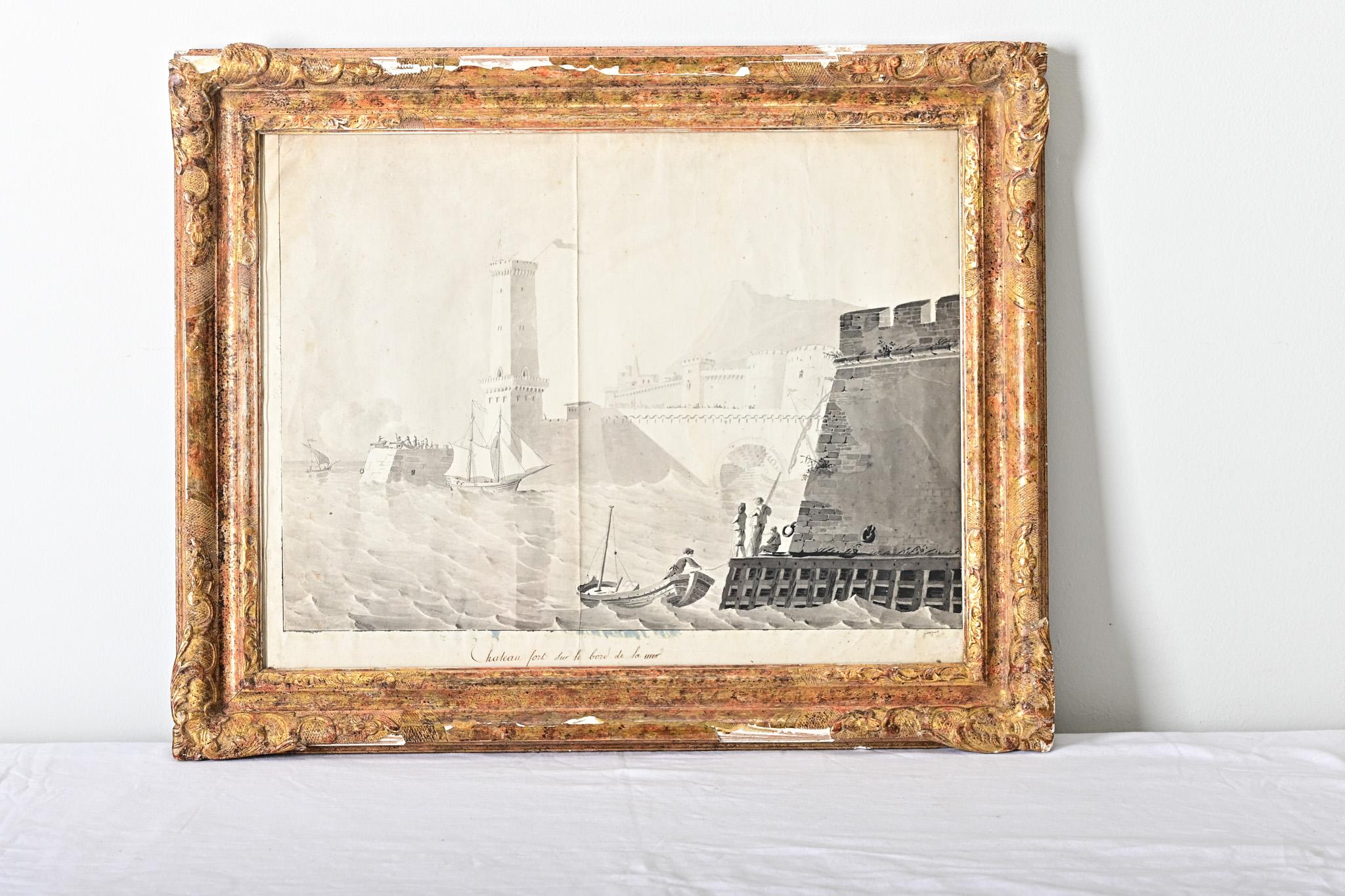 French 19th century framed lithograph print of a seaside fort at some unknown locale, simply titled Chateau fort sur le bord de la mer, translating to a “castle on the seaside.” Rendered in a monochromatic grayscale, the scene is dominated by a