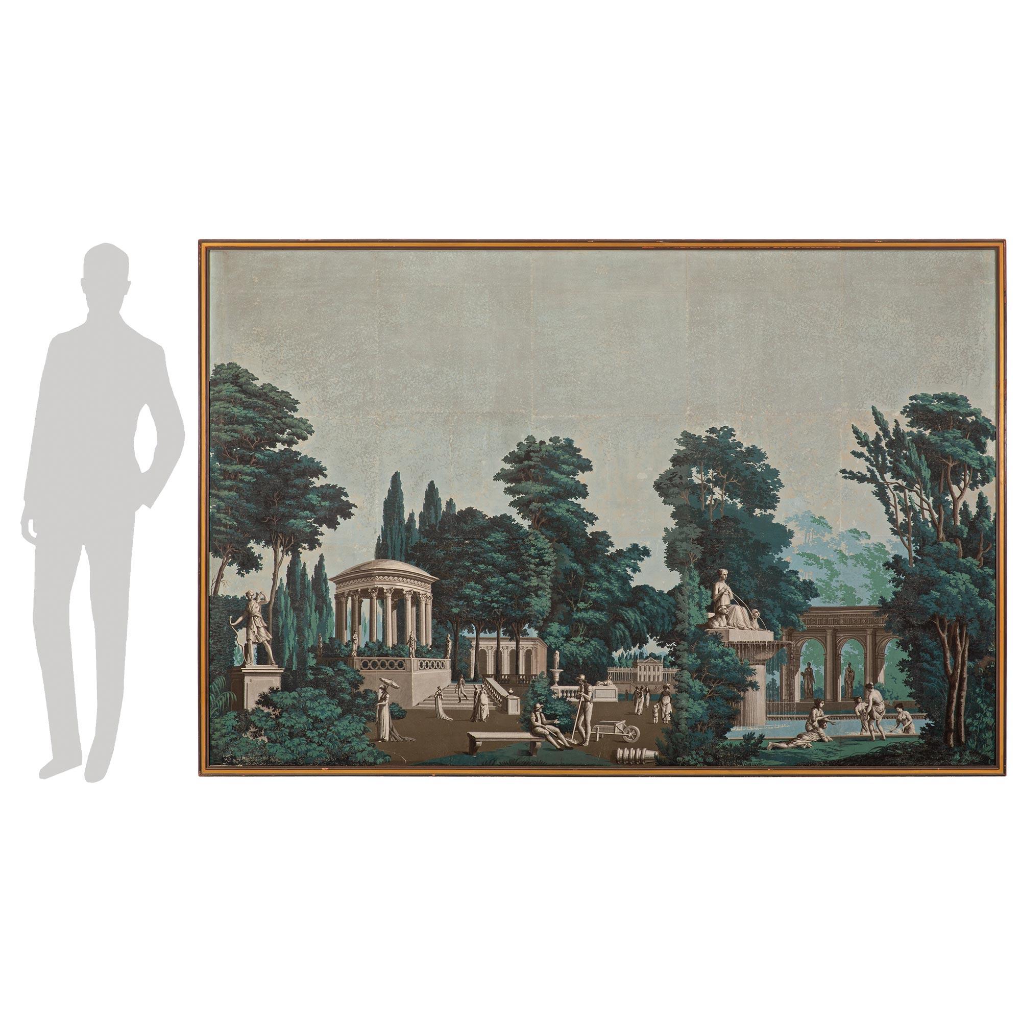 A most decorative and very large scale French 19th century framed wallpaper wall decor. The wallpaper is set within a straight patinated frame with an elegant mottled design. The wallpaper depicts a lovely scene in a French park on a beautiful clear