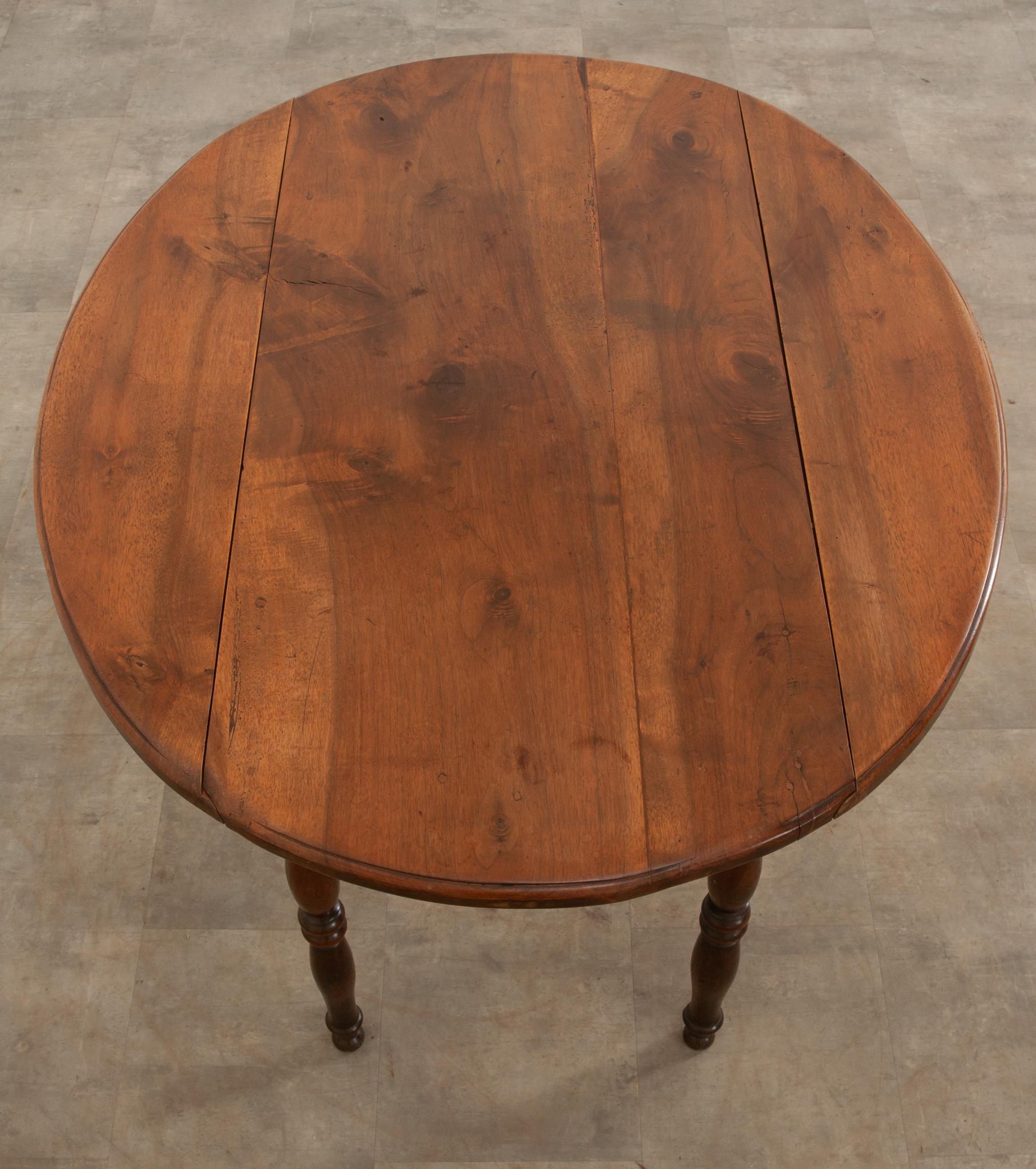 Hand-Crafted French 19th Century Fruitwood Drop Leaf Table