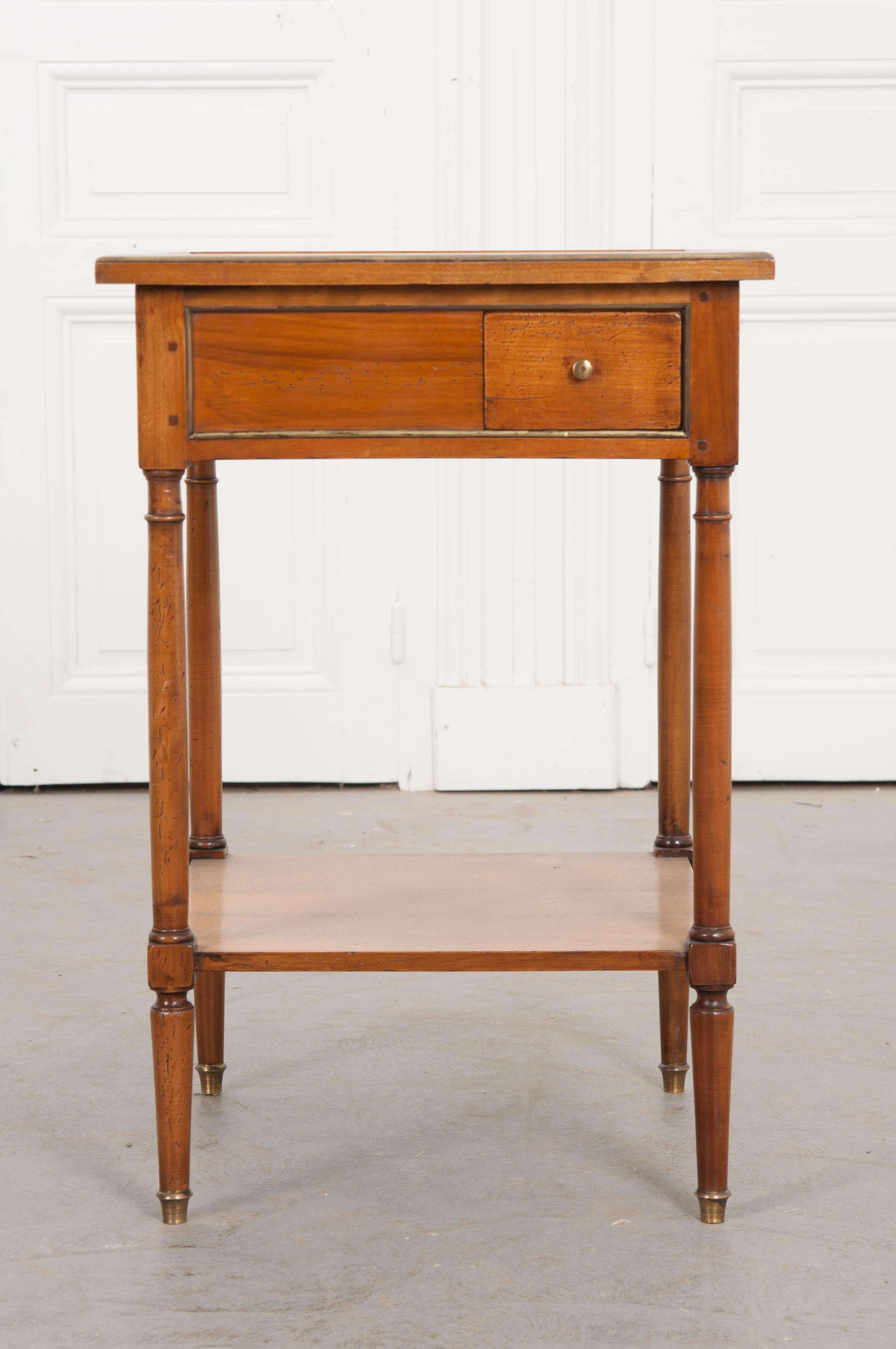 Easily one of the most fun pieces of furniture made, the rafraîchissoir is a small side table designed for “refreshment”, and our 19th century French fruitwood piece is no exception. Outfitted with two newly created copper wine bucket inserts, this