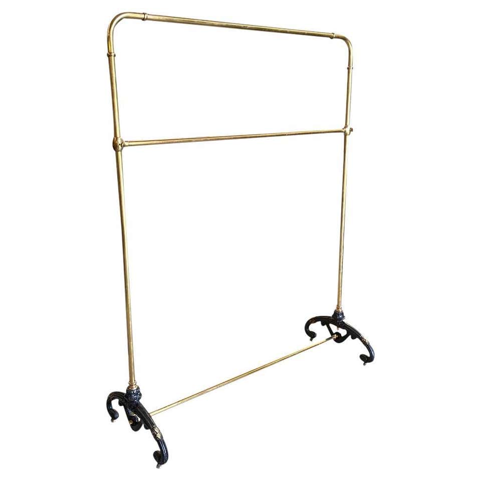 Vintage Rolling Garment Rack Clothes Rack For Sale at 1stDibs