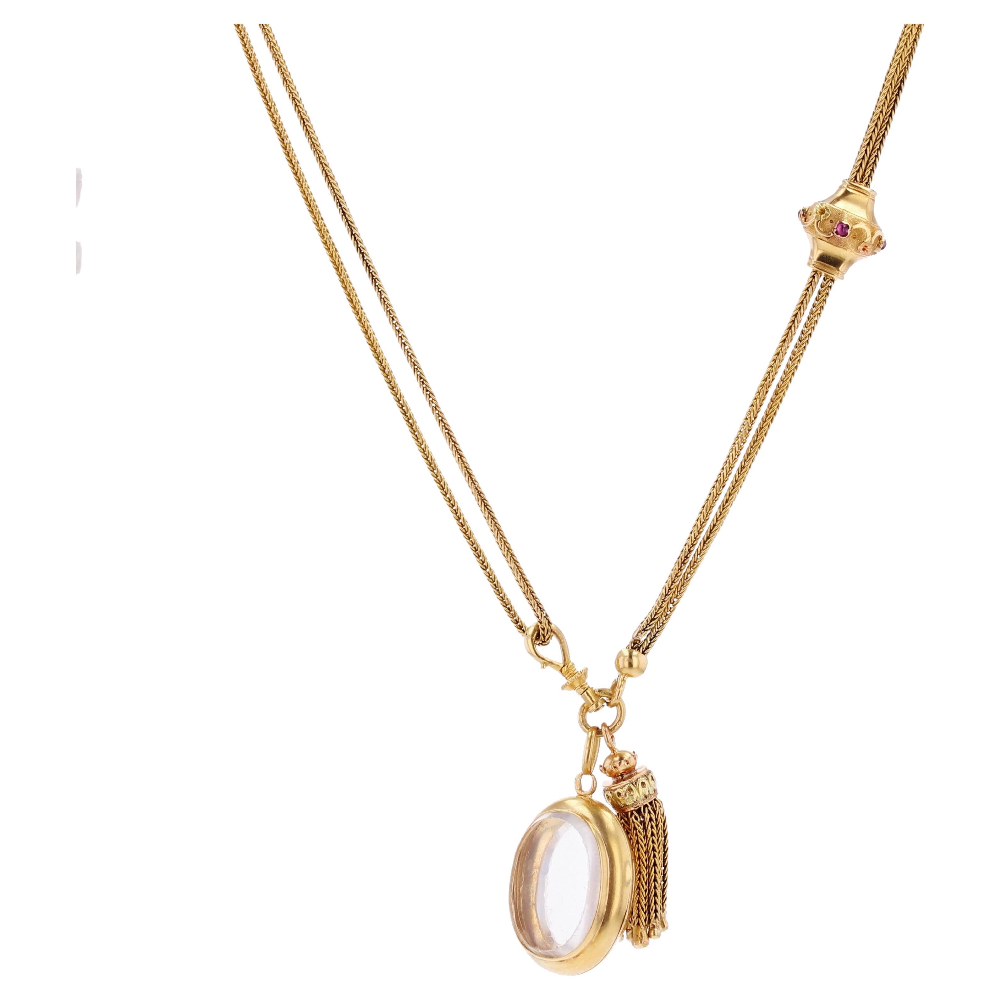 Long collier français du 19ème siècle en or jaune 18 carats avec médaillon et pompon en grenat 