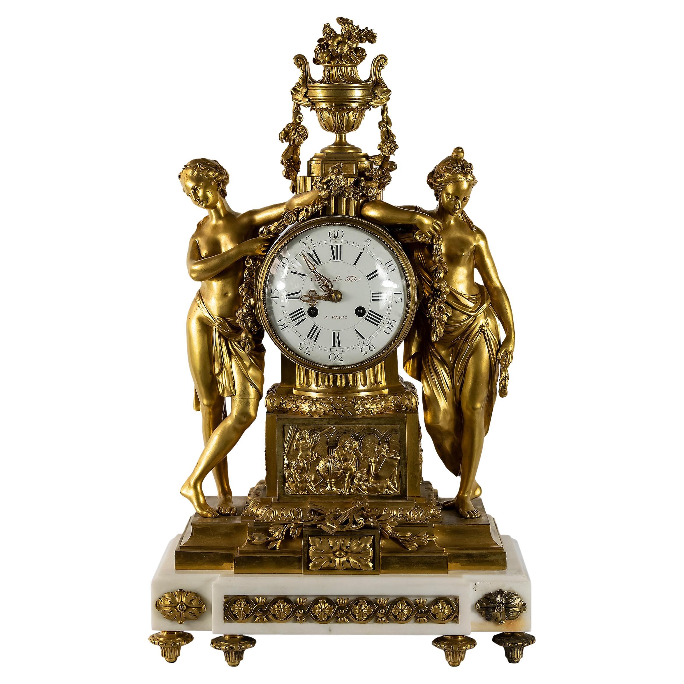 Pendule de cheminée française du 19ème siècle en bronze doré et marbre Caron Le Fils A Paris en vente
