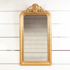 French 19th century gilded wood mirror with small pediment