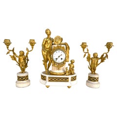 French 19th Century Gilt Bronze Clock & Candelabra Set