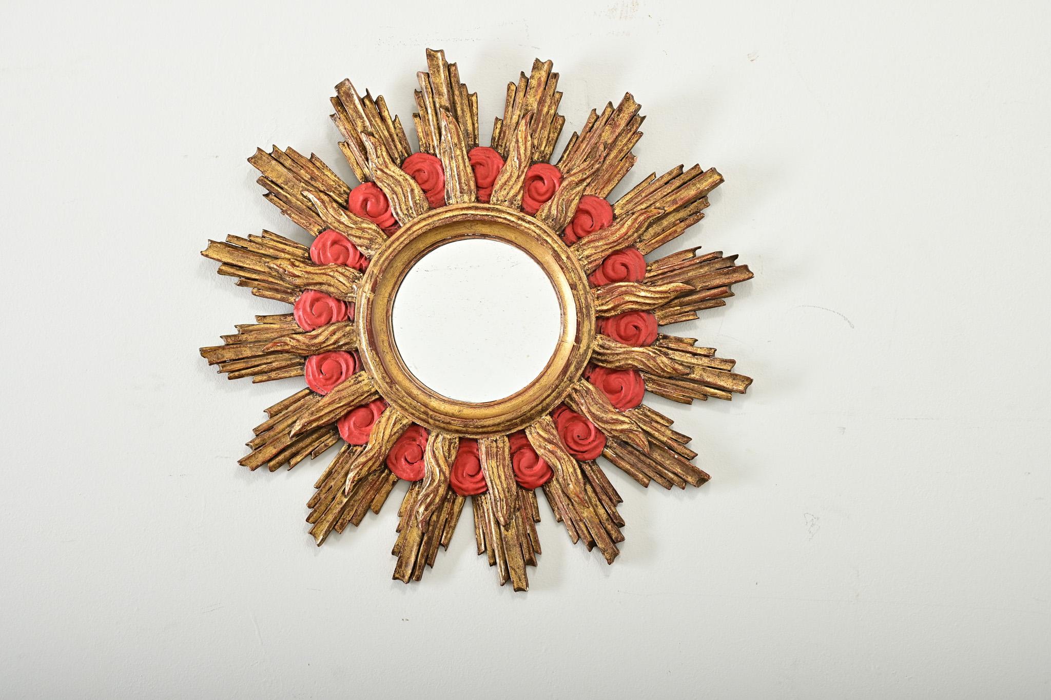 19th century French gilt wood starburst mirror in alternating rays of flames and lightning bolts that radiates a kind of energy and dynamism to stand on its own or stand out in a gallery wall. Arranged in three distinct themes, the sharpness of the