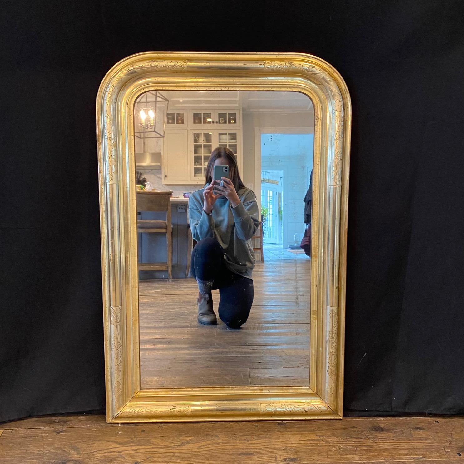 Really decorative Louis Philippe mirror with beautiful gold gilt finish. There are lovely subtle floral patterns etched in the sides. Creates a very polished look.
Inside mirror H 31.25” x Inside mirror W 18.25”
#5856
