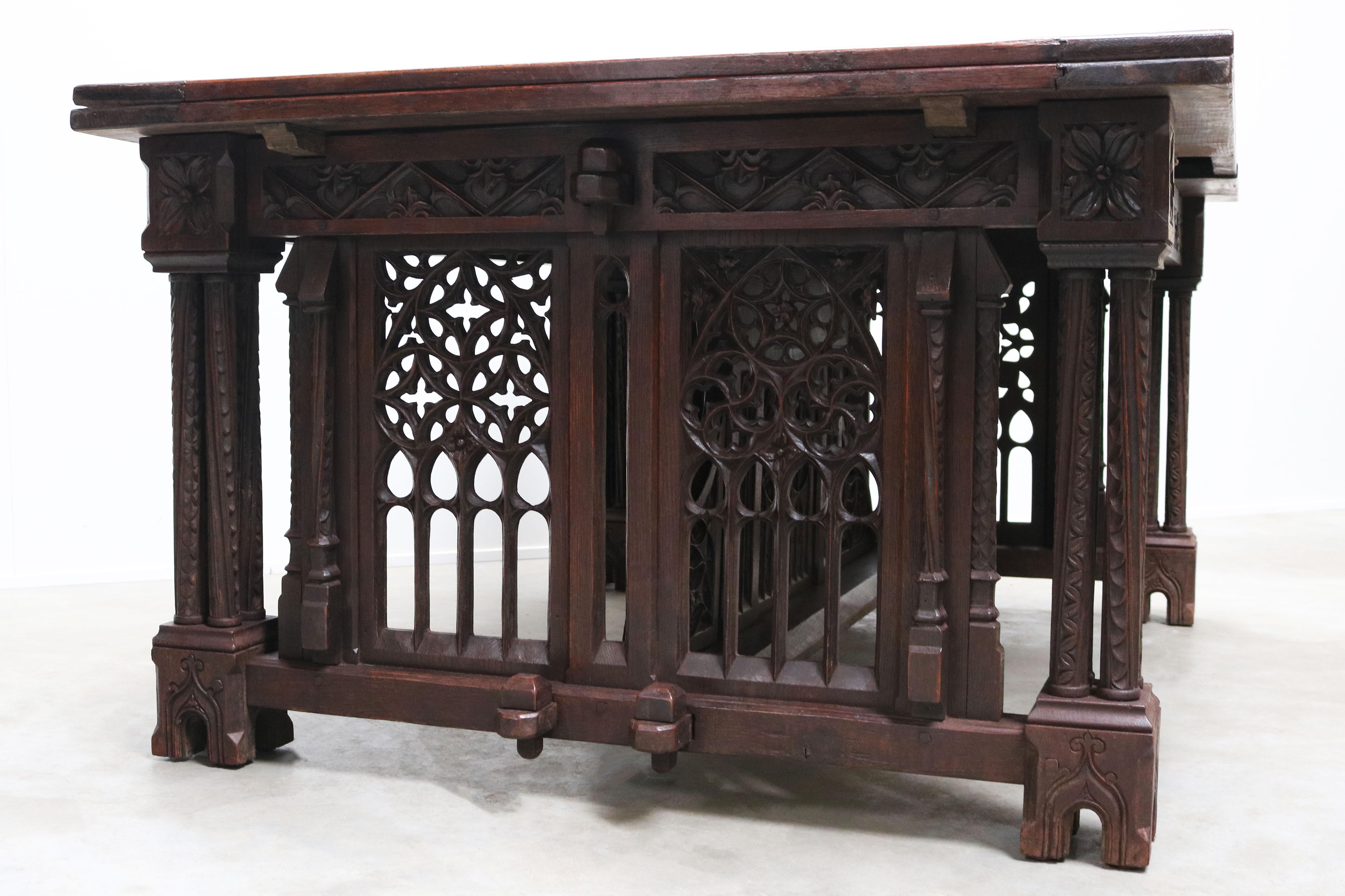 Step back in time with our exquisite Gothic Revival Monastery Table, crafted in 870 from European Oak wood. This striking piece is made for those who appreciate the old-world charm of Gothic architecture and the intricate details and feeling of