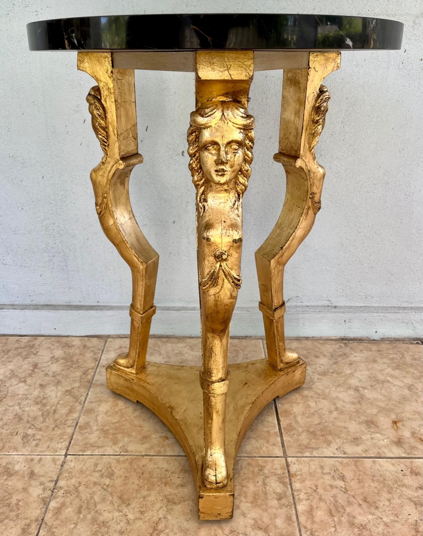French 19th century Grand Tour neoclassical Giltwood Gueridon.

Antique French late 19th century Neoclassical Gueridon. This magnificent Gueridon with slender form and classic female caryatids demonstrates the stylistic influence of the Louis XVI