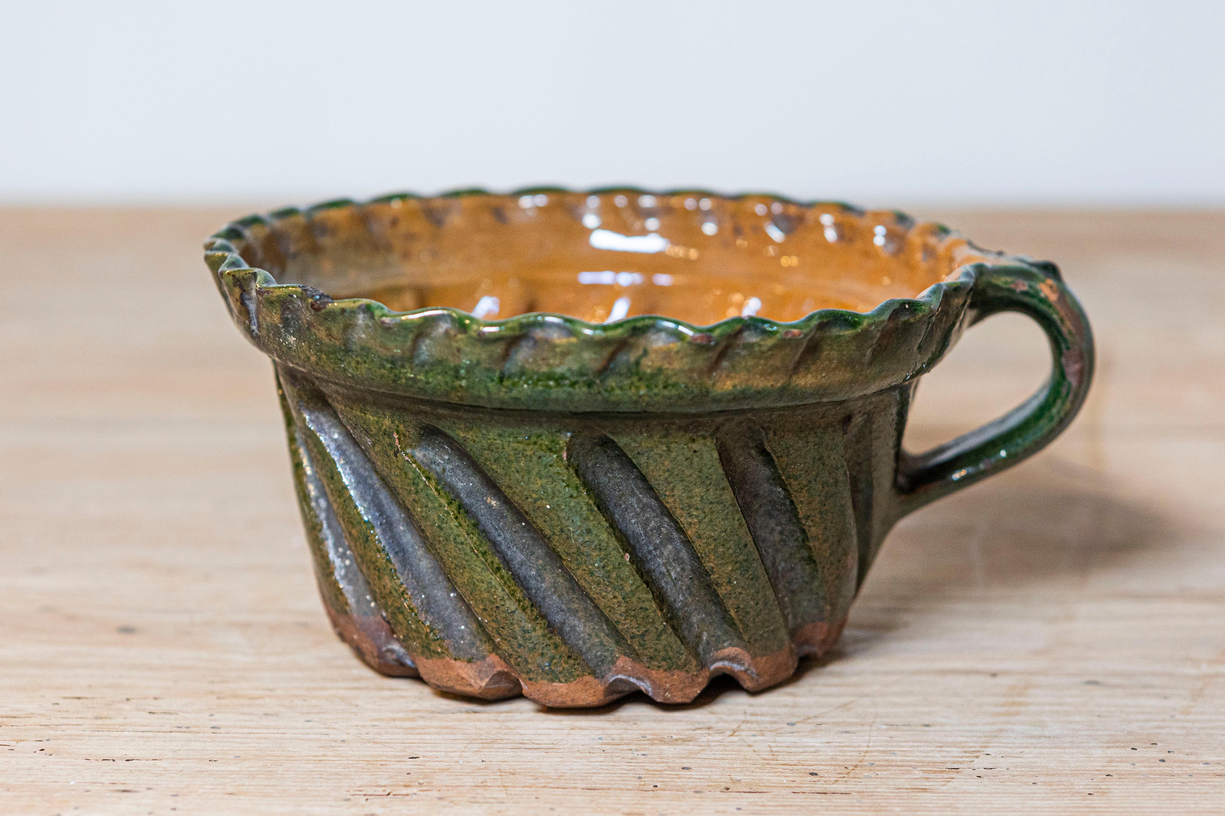 Rustic French 19th Century Green and Brown Glazed Pottery Cake Mold with Grooves For Sale