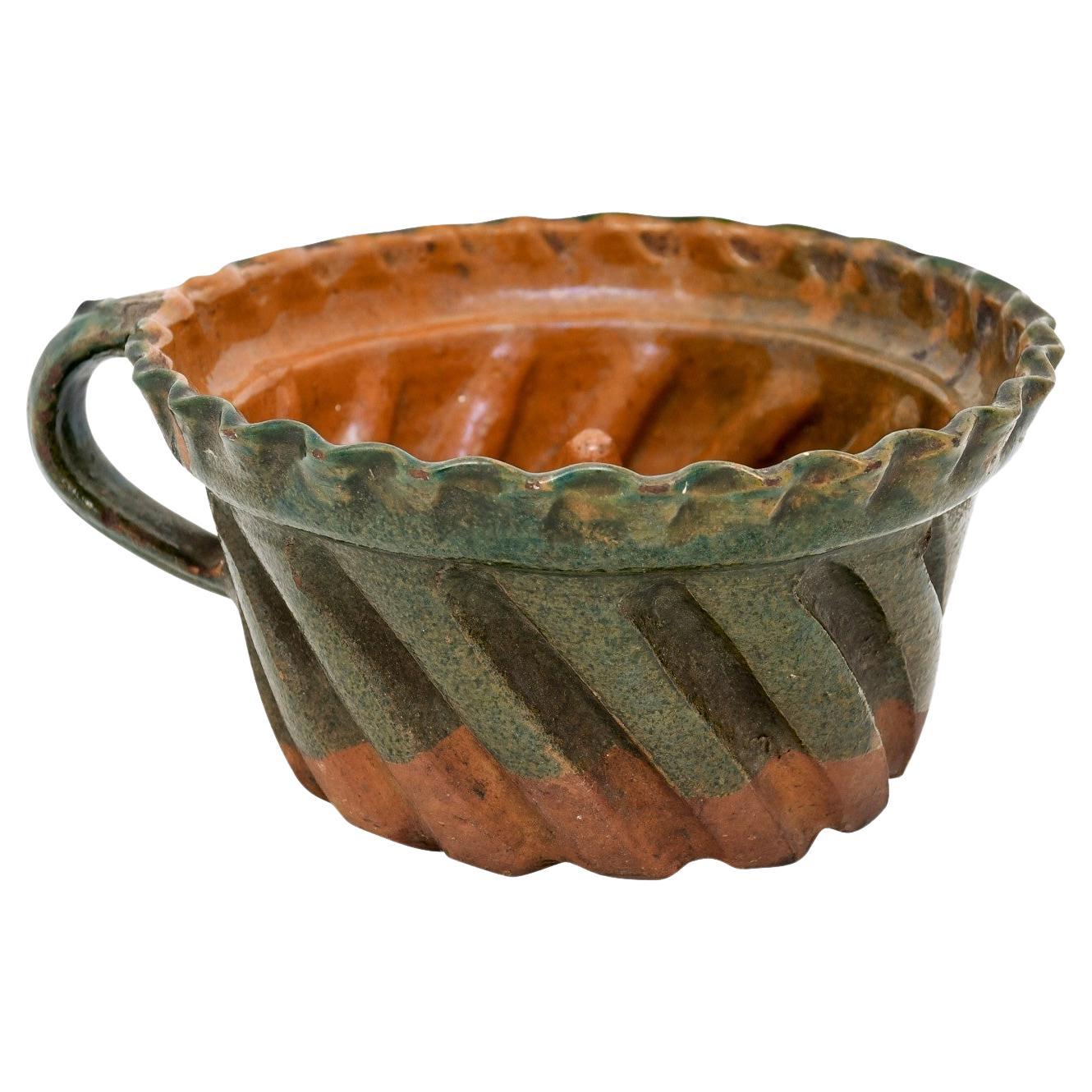 French 19th Century Green and Brown Glazed Pottery Cake Mold with Grooves