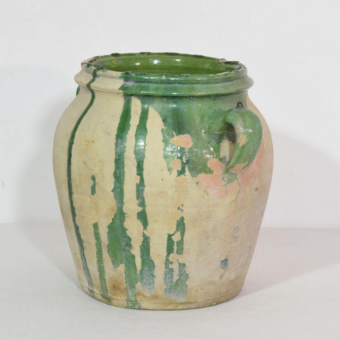 Great authentic and rare piece of pottery from the Provence. Beautiful weathered and an amazing color. Imperfections help authenticate this water cruche as it was an utilitarian type piece.
France circa 1850-1900, weathered.