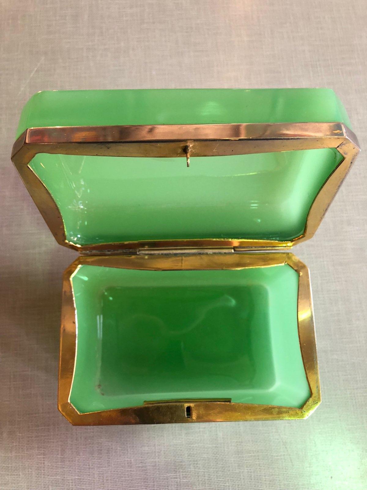 A brass clad French 19th century green opaline box.