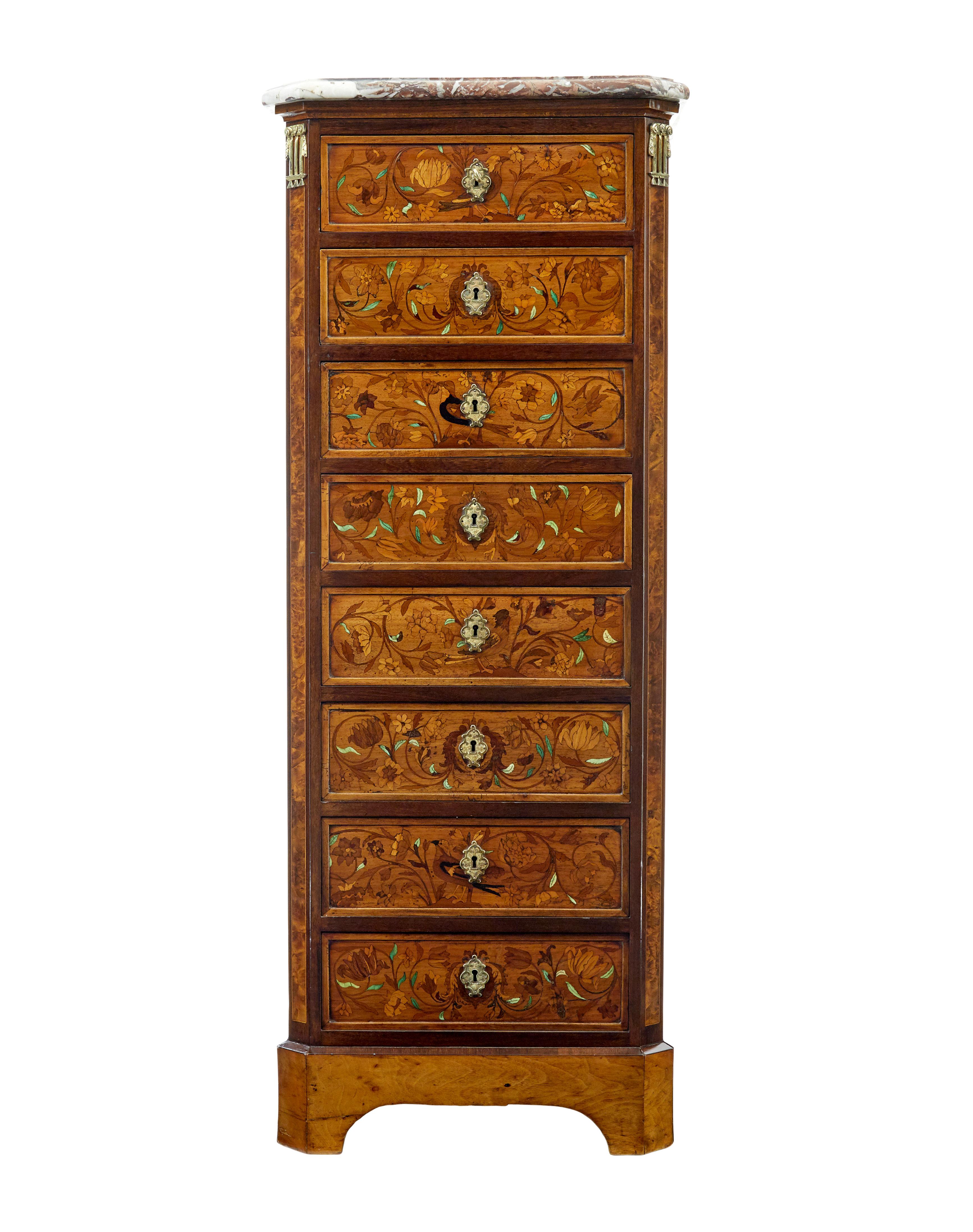 French 19th century inlaid chest of drawers with marble top circa 1880.

We are pleased to offer this rare tallboy 8 drawer chest of drawers, which offers plenty of storage for such a small footprint.

Stunning loose fitting original marble top with