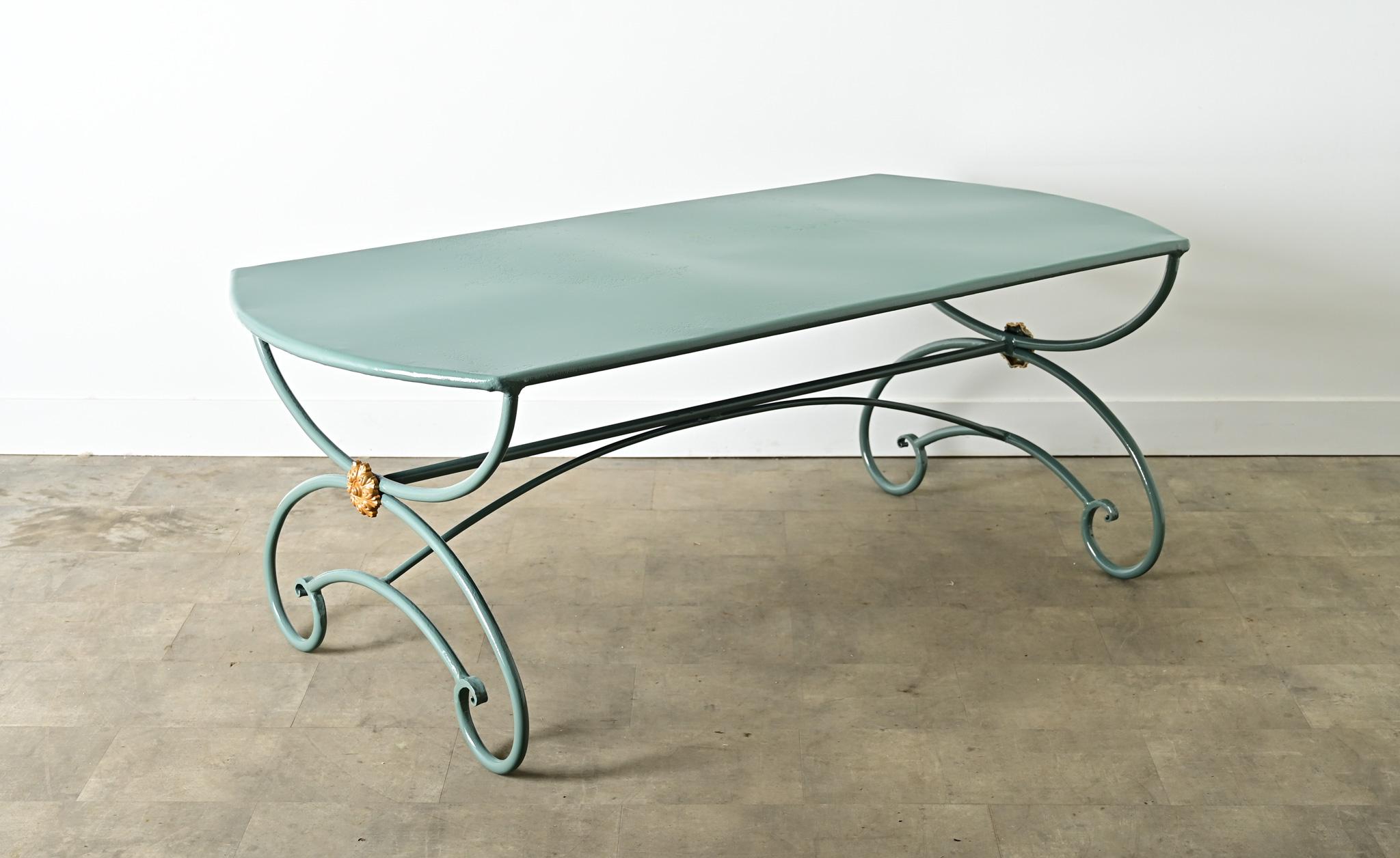 A heavy cast iron 19th Century Parisian boucherie or presentation table (like those found in a butcher shop or bakery). Recently powdercoated in a refreshing shade of Caribbean blue for relaxed al fresco meals. The oblong-oval top is a single sheet