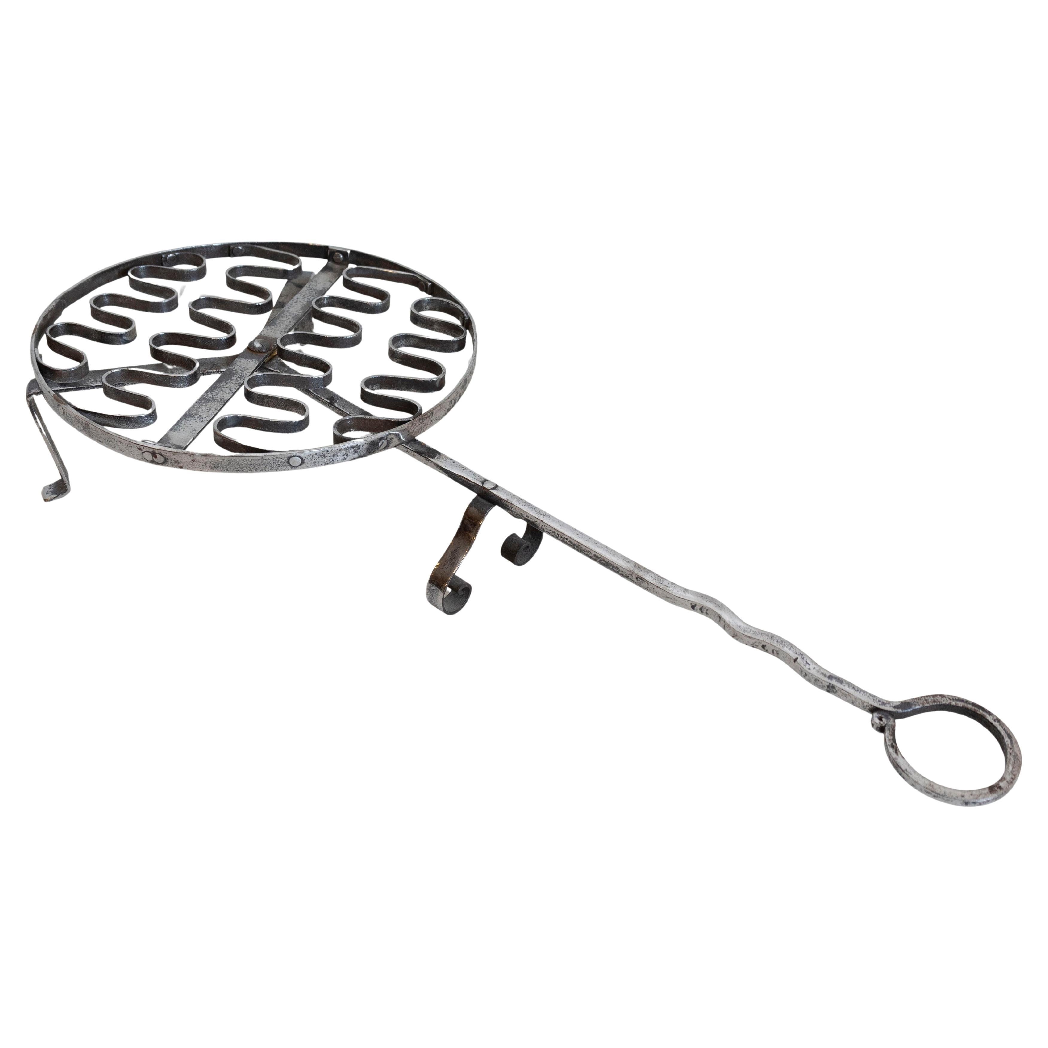 French 19th Century Iron Fireplace Grill with Petite Feet and Long Handle For Sale