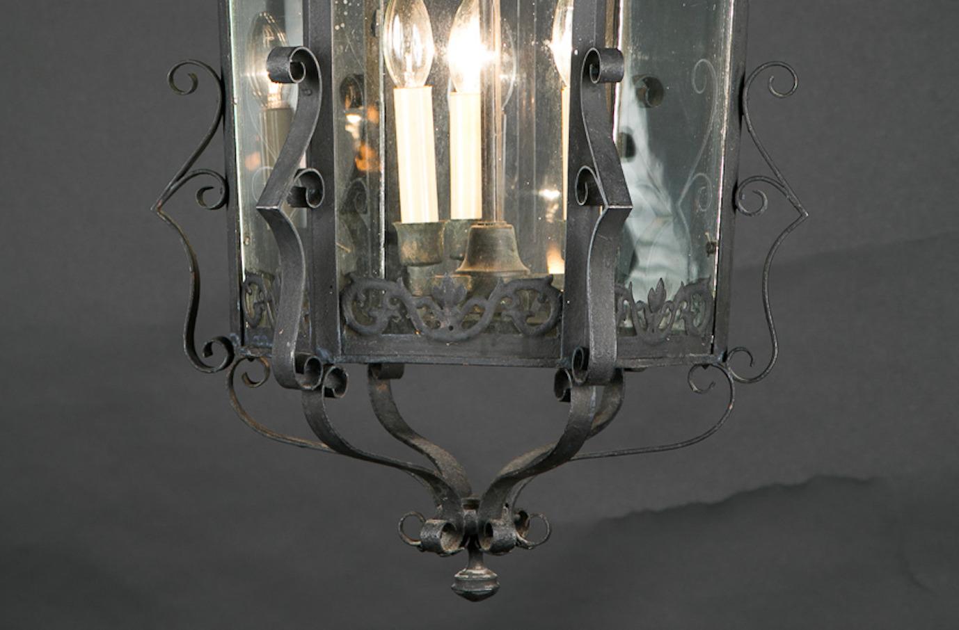 Glass French 19th Century Iron Hanging Lantern with Groups of Fleur De Lis at Top For Sale