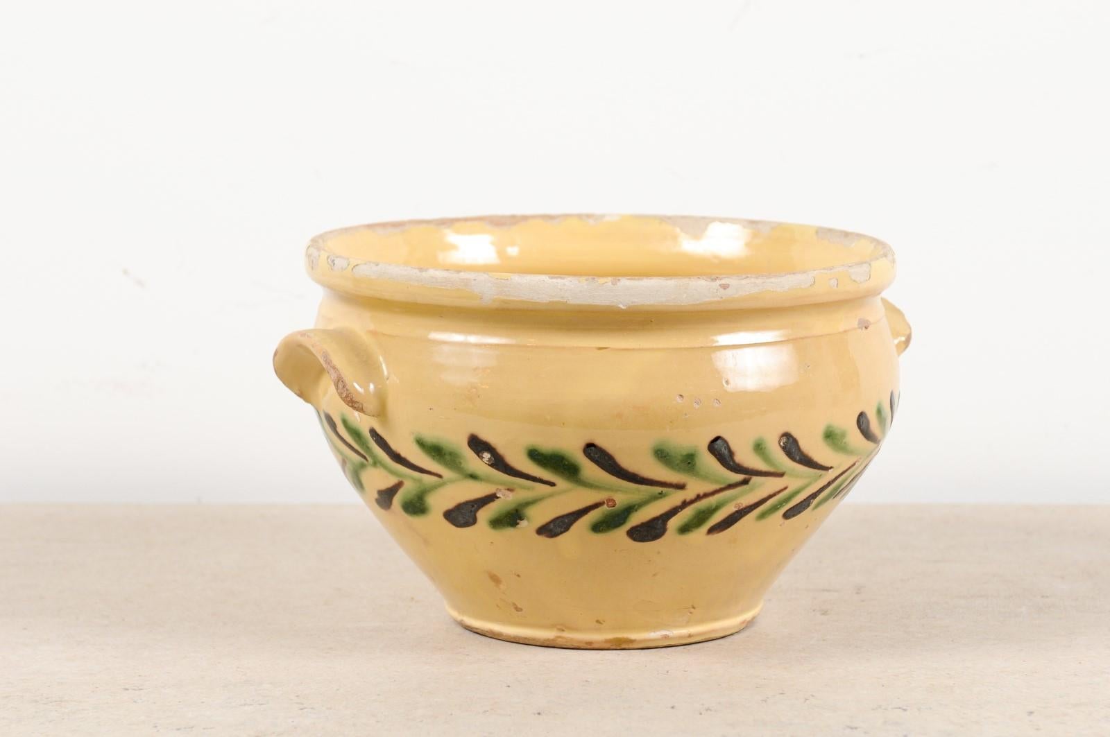 A French jaspe pottery bowl from the 19th century, with olive tree leaf motifs. Crafted in France during the 19th century, this jaspe pottery bowl features a circular silhouette, adorned with stylized olive tree leaf motifs, standing out beautifully