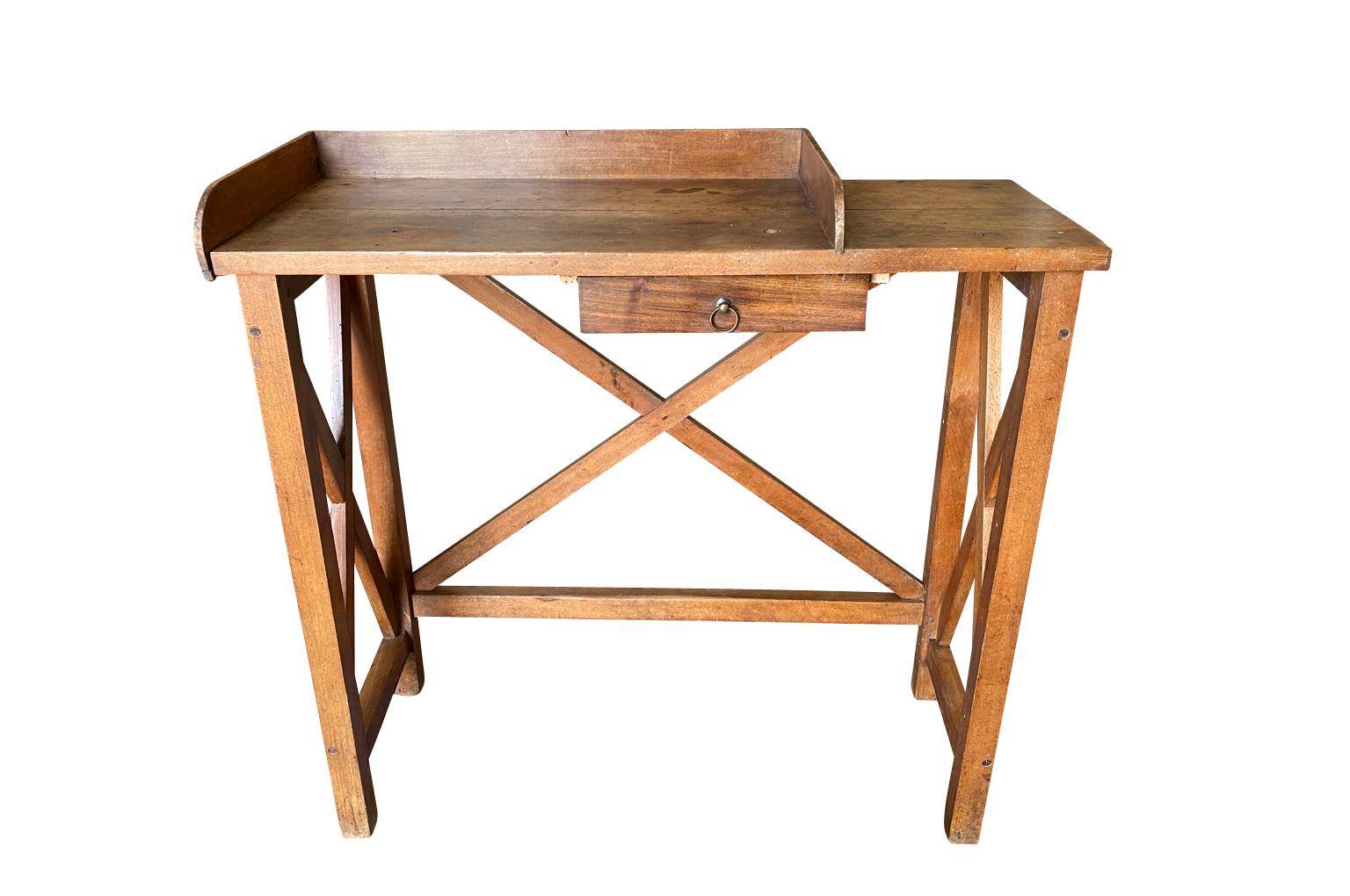 A very charming 19th Century Jeweler's Work Table from the South of France. Nicely constructed from beech. Serves beautifully as a bar counter or a restaurant host's table.