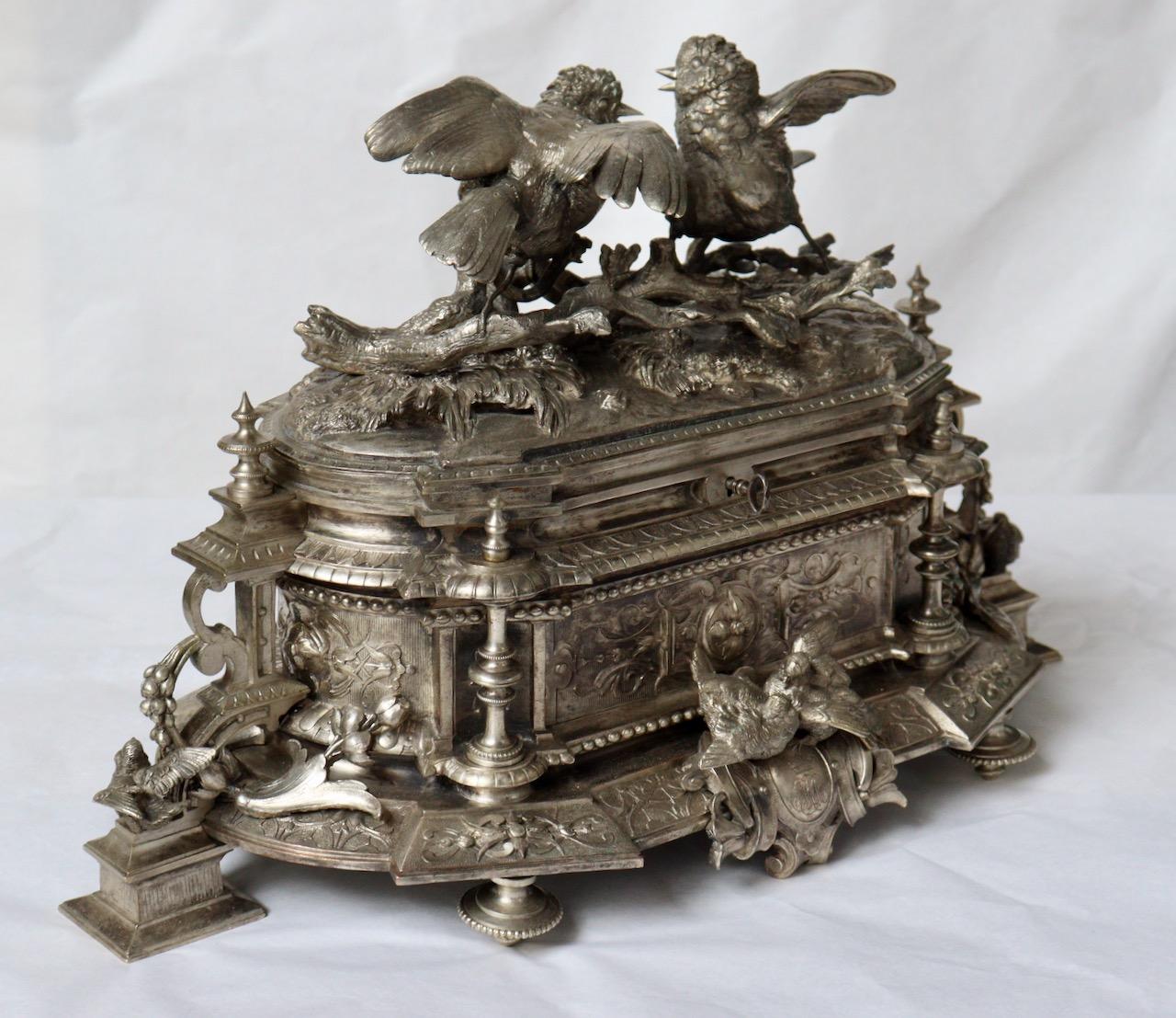 French 19th century jewelry casket by Alphonse Giroux et Cie Paris & J.Moigniez (1835-1894)
Silvered bronze richly decorated with Love Birds, branches and foliages
Signed J.Moigniez on the lid
Engraved Alph.Giroux et Cie Paris and silvered
