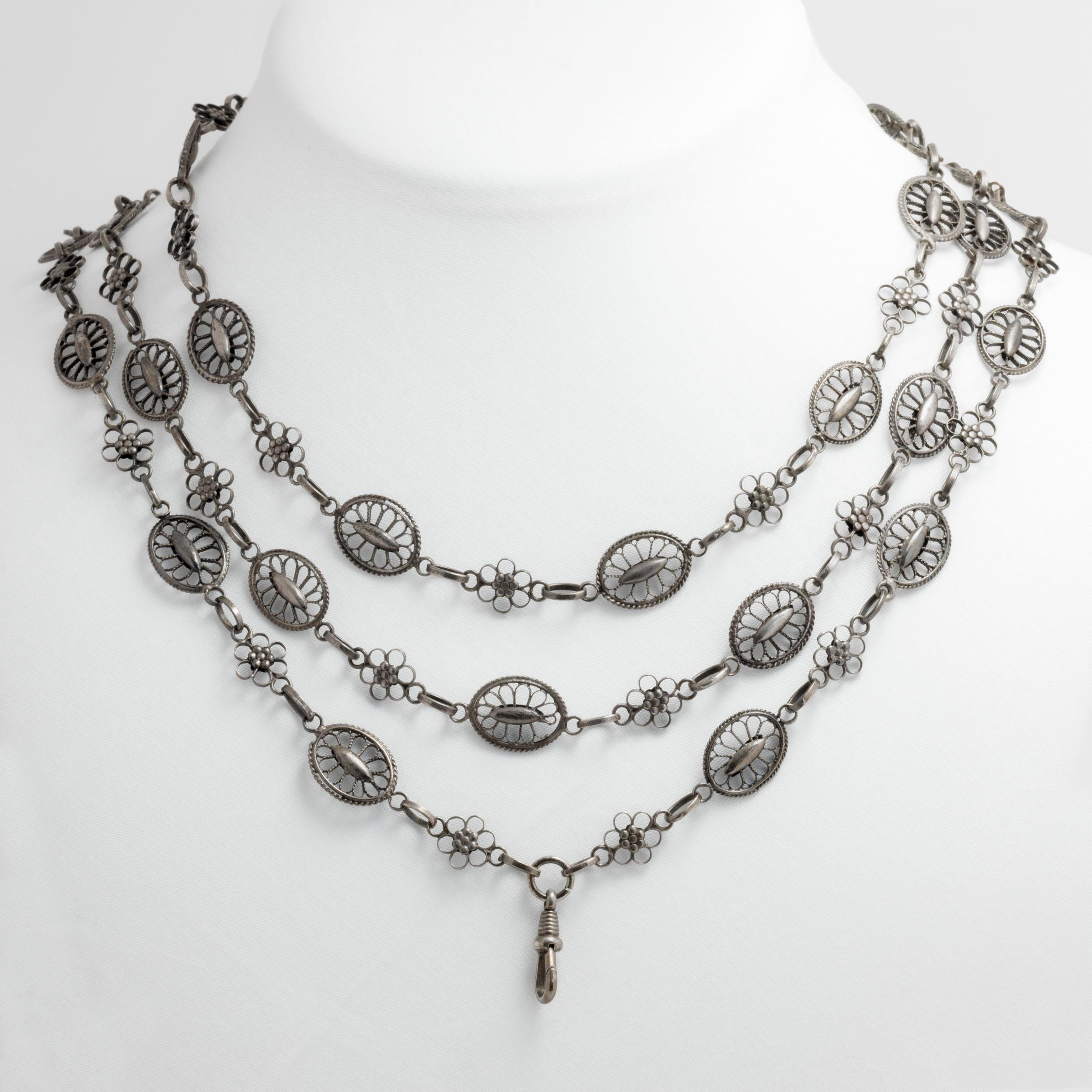French 19th Century Lacey Silver Muff Chain Sautoir

L: 158 cm / 62 in.
40 grams

Fabulous long French antique chain