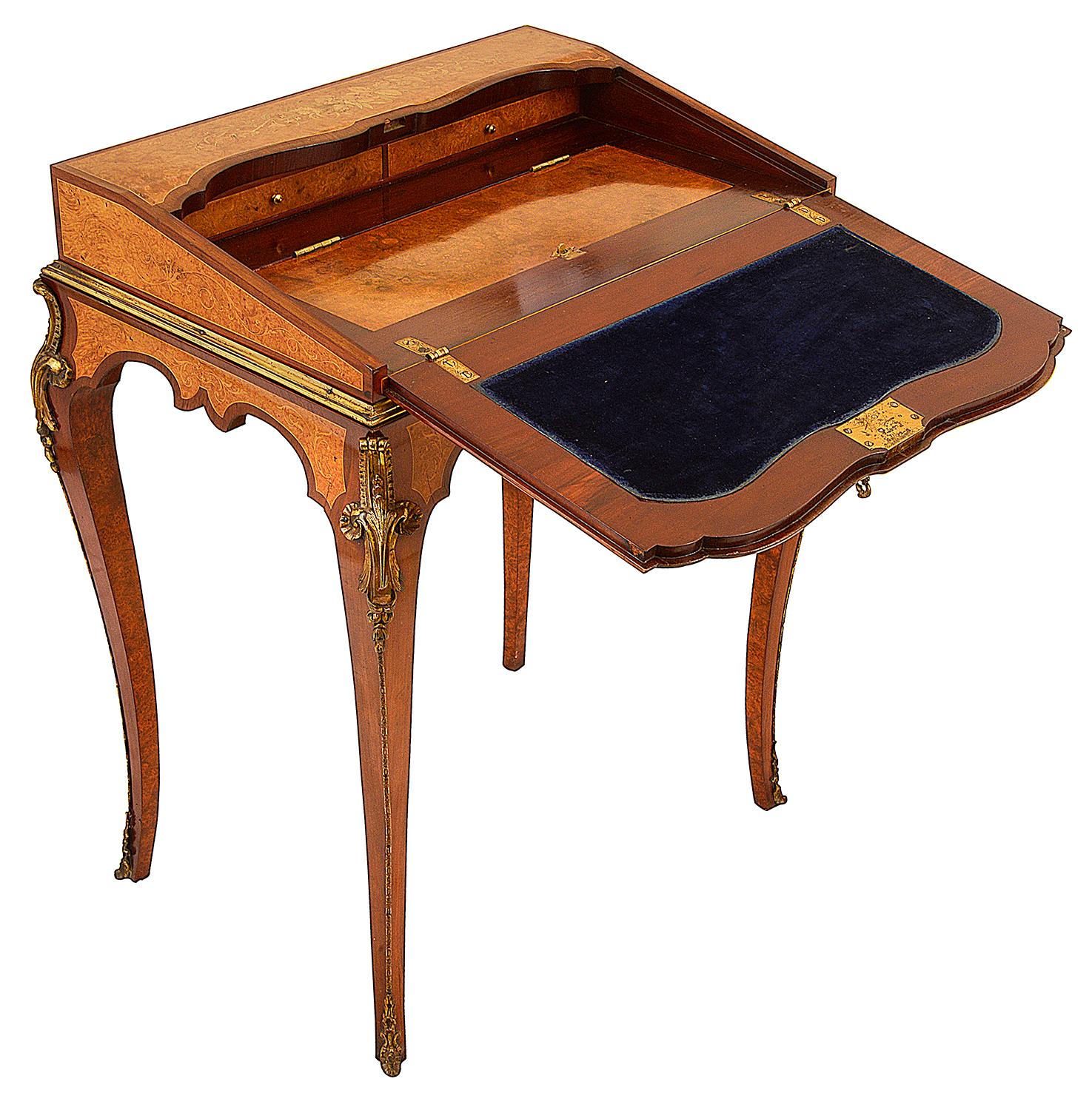 French 19th Century ladies fall front bureau de dame, having wonderful Amboyna, veneers with classical Boxwood inlay to the centre depicting a classical urn with over flowing flowers. Opening to reveal an inset writing tablet, drawers and pigeon