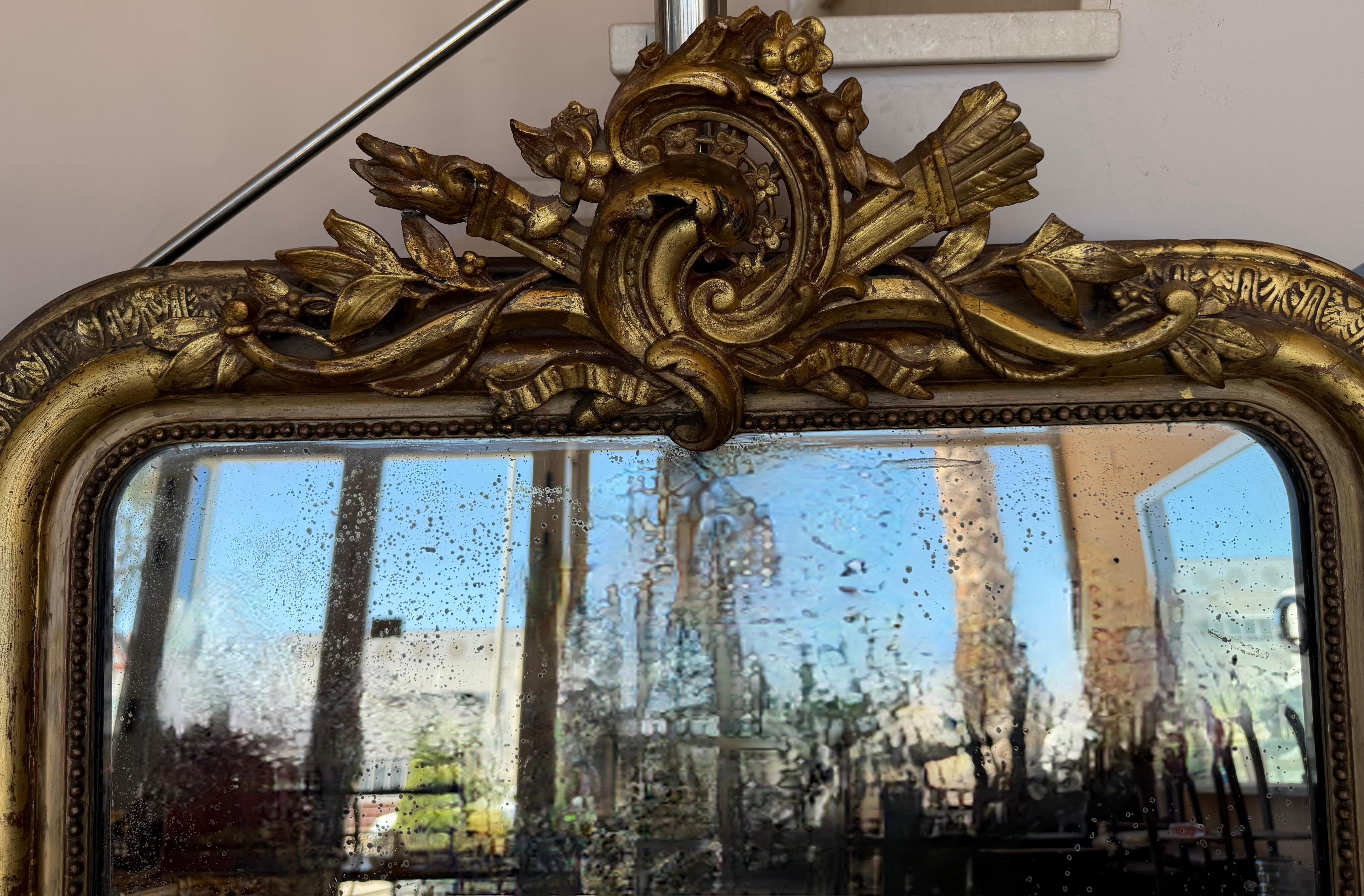 French 19th Century Large Vertical Gold Gilt Mirror with Floral crest In Good Condition For Sale In Miami, FL