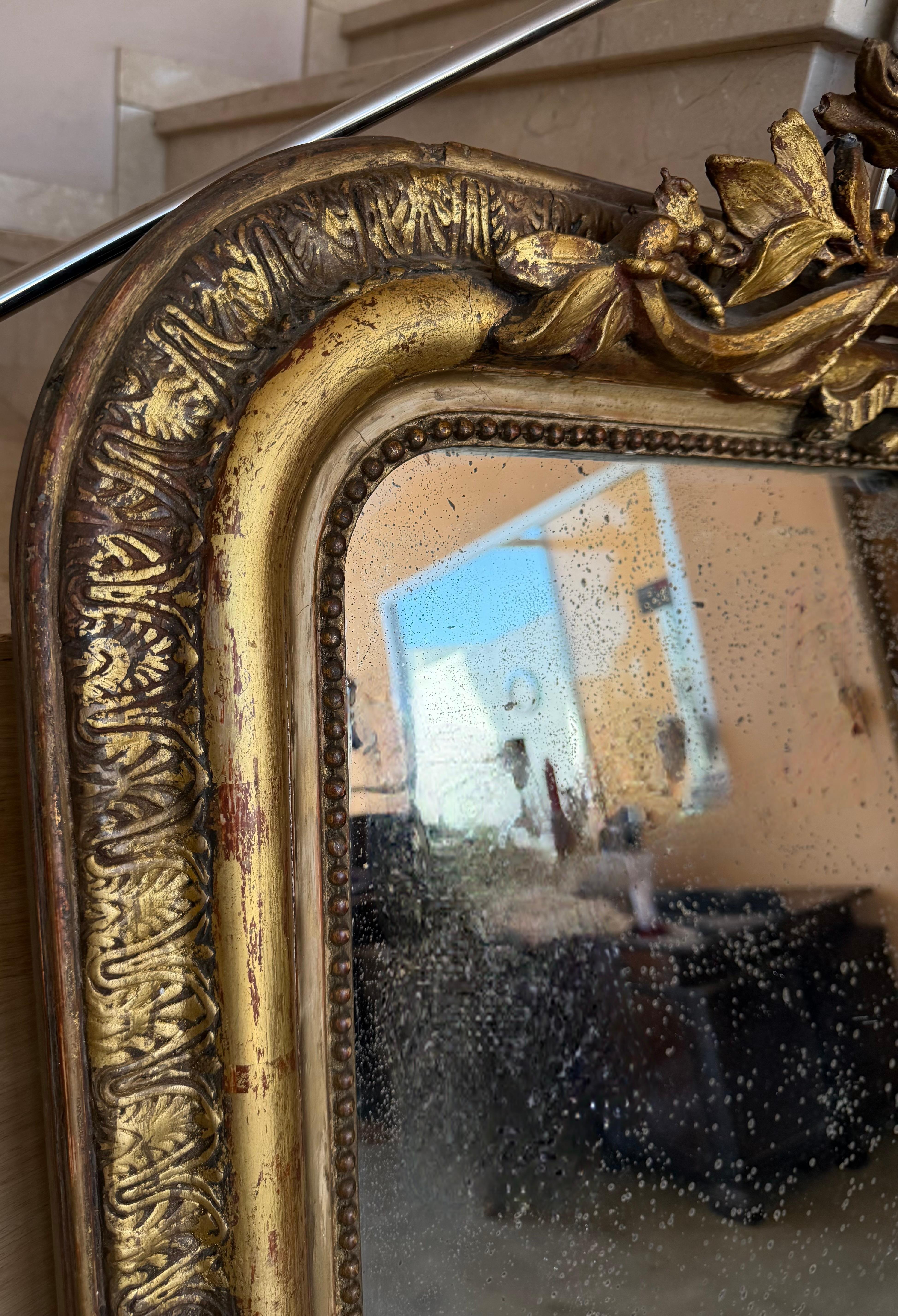 Giltwood French 19th Century Large Vertical Gold Gilt Mirror with Floral crest For Sale