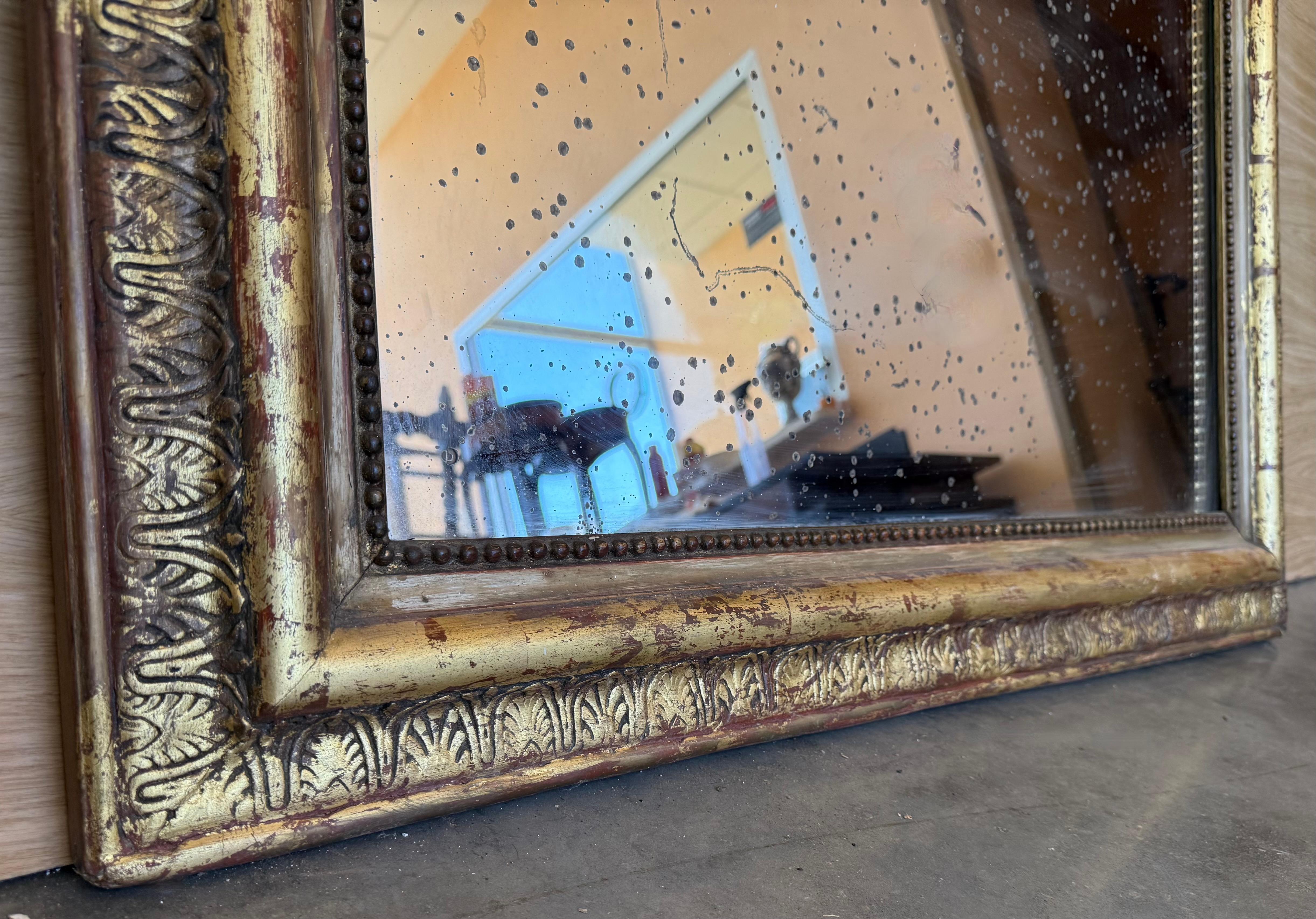 French 19th Century Large Vertical Gold Gilt Mirror with Floral crest For Sale 1