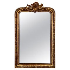 French 19th Century Large Vertical Gold Gilt Mirror with Floral crest