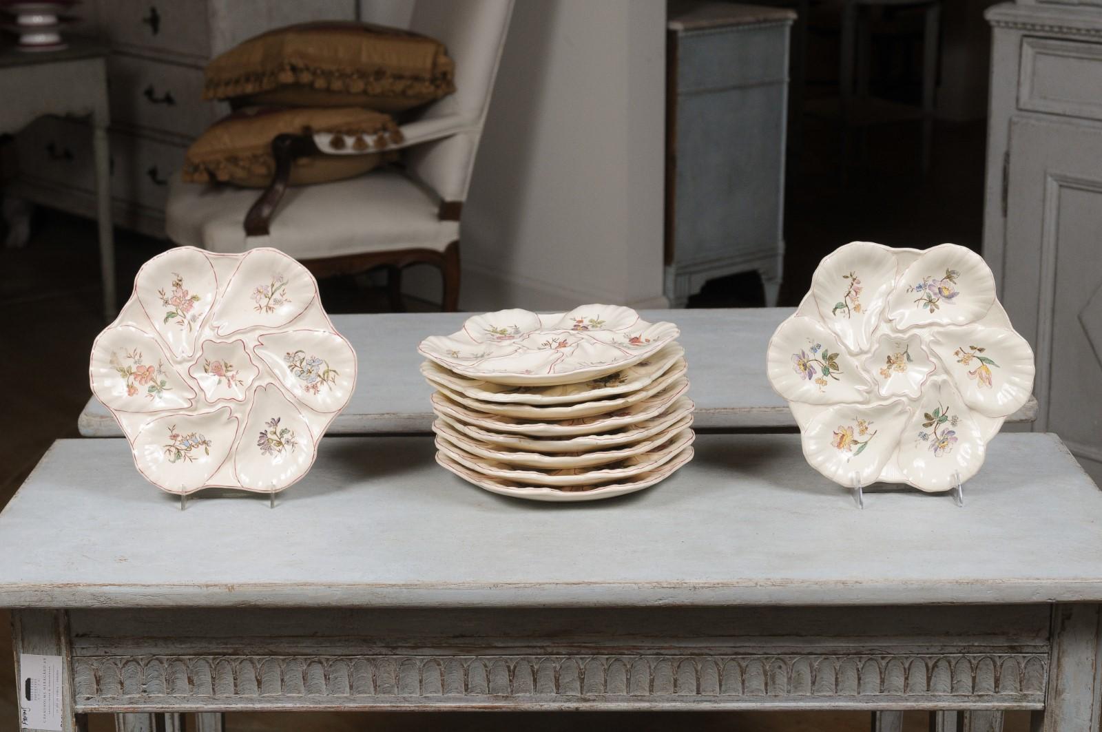 French Longchamp Terre de Fer Majolica oyster plates from the late 19th century, with flowers and pink outline. We currently have 10 plates available, priced and sold individually. Also view oyster platter LU835919236182 should you need the whole