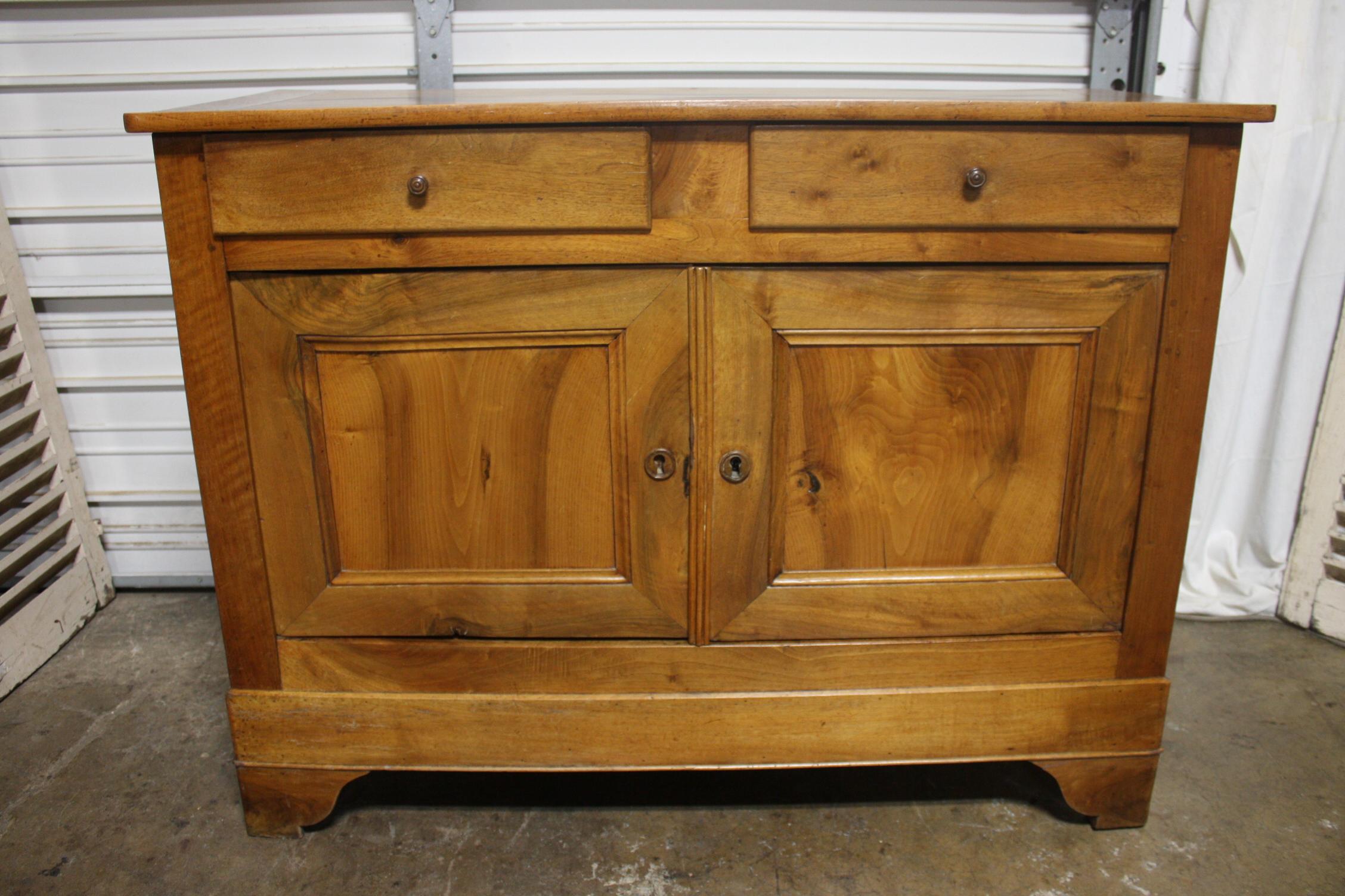 This buffet is made of blond walnut. Nice proportion and not too deep, it can be mixed with the modern furniture.