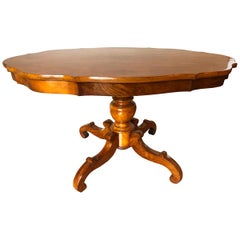 Table guéridon à plateau basculant en noyer sculpté Louis Philippe du XIXe siècle français