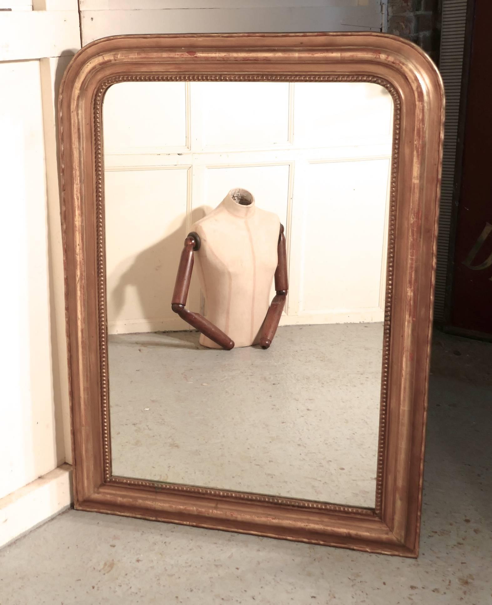French, 19th century Louis Philippe gold mirror

This is a charming Wall Mirror a genuine example of French chic furnishing, the 4” mirror frame has had a few knocks over the years so it has been given a re polish to brighten it up while still