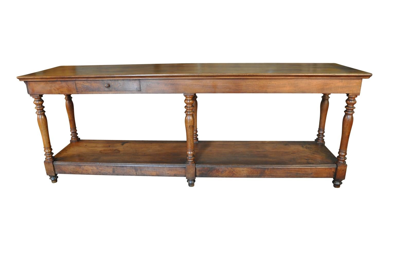 A very handsome Louis Philippe period Draper's table, console from the South of France. Beautifully constructed from walnut with a lovely patina. Perfect as a console or sofa table.