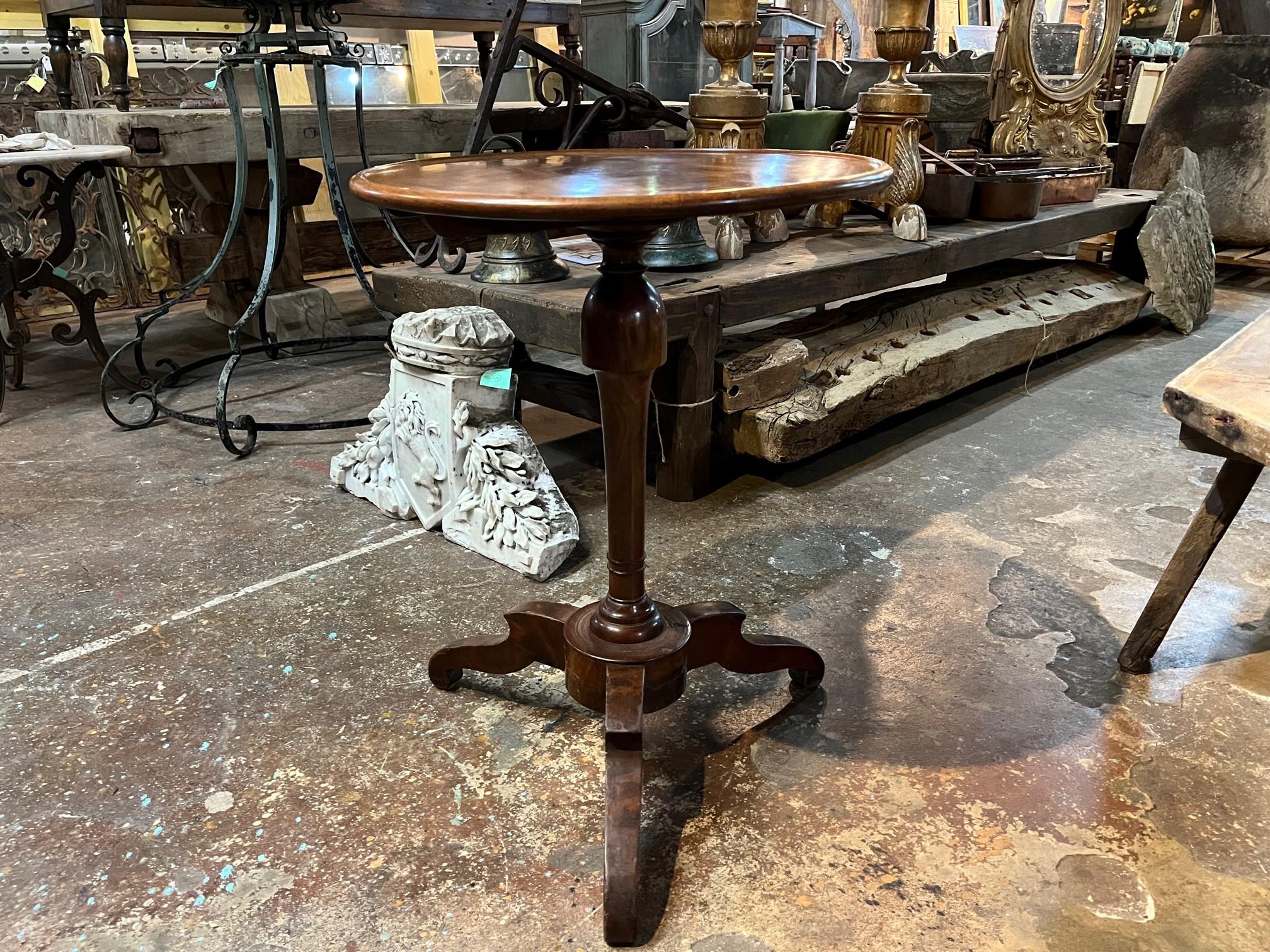 A very lovely later 19th century Louis Philippe Gueridon style in fruitwood from the South of France. Handsomely constructed with a baluster shape pedestal and tripod legs. Wonderful tone and patina.