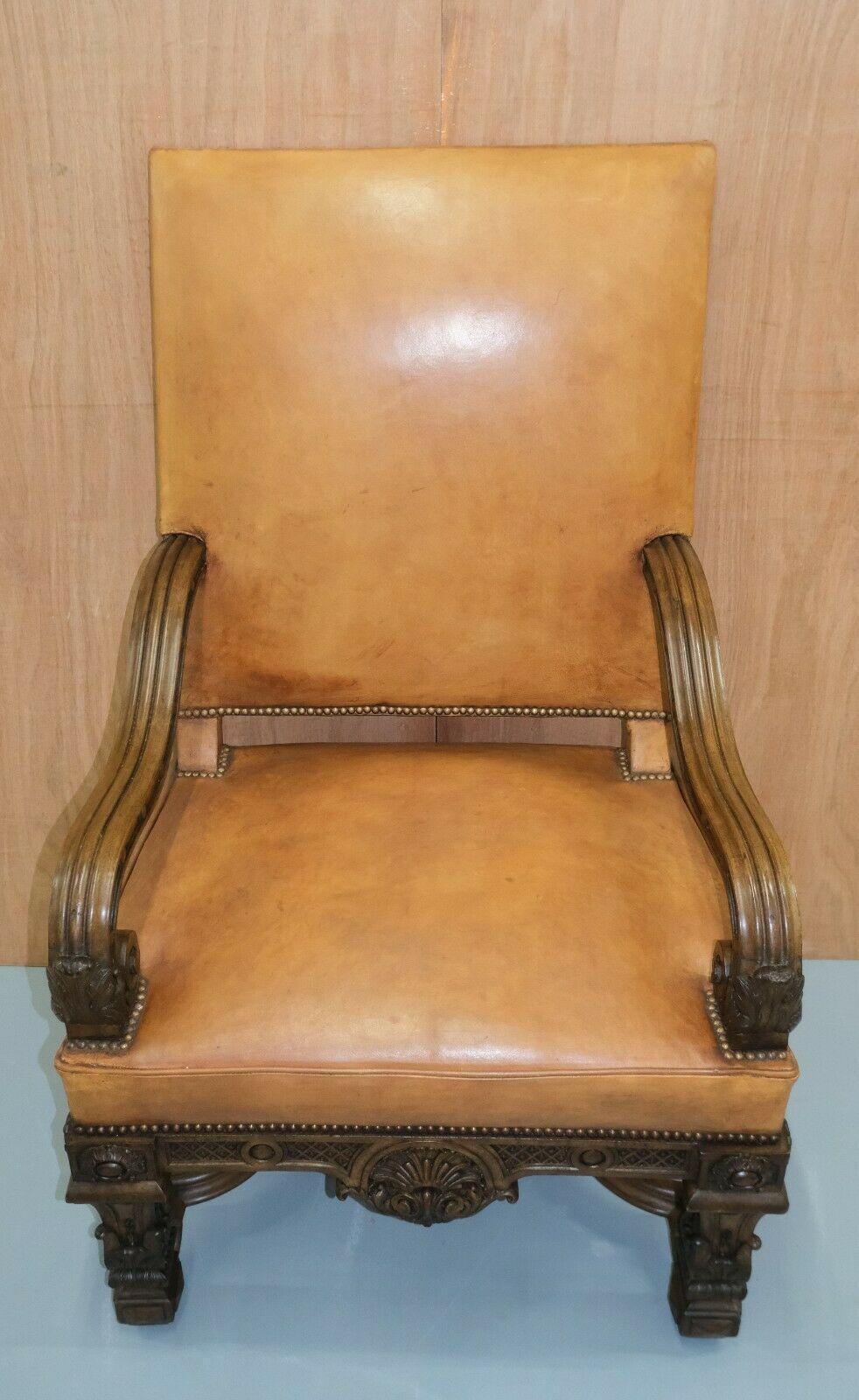 Hand-Crafted French 19th Century Louis XIV Carved Oak Leather Armchair with Matching Stool