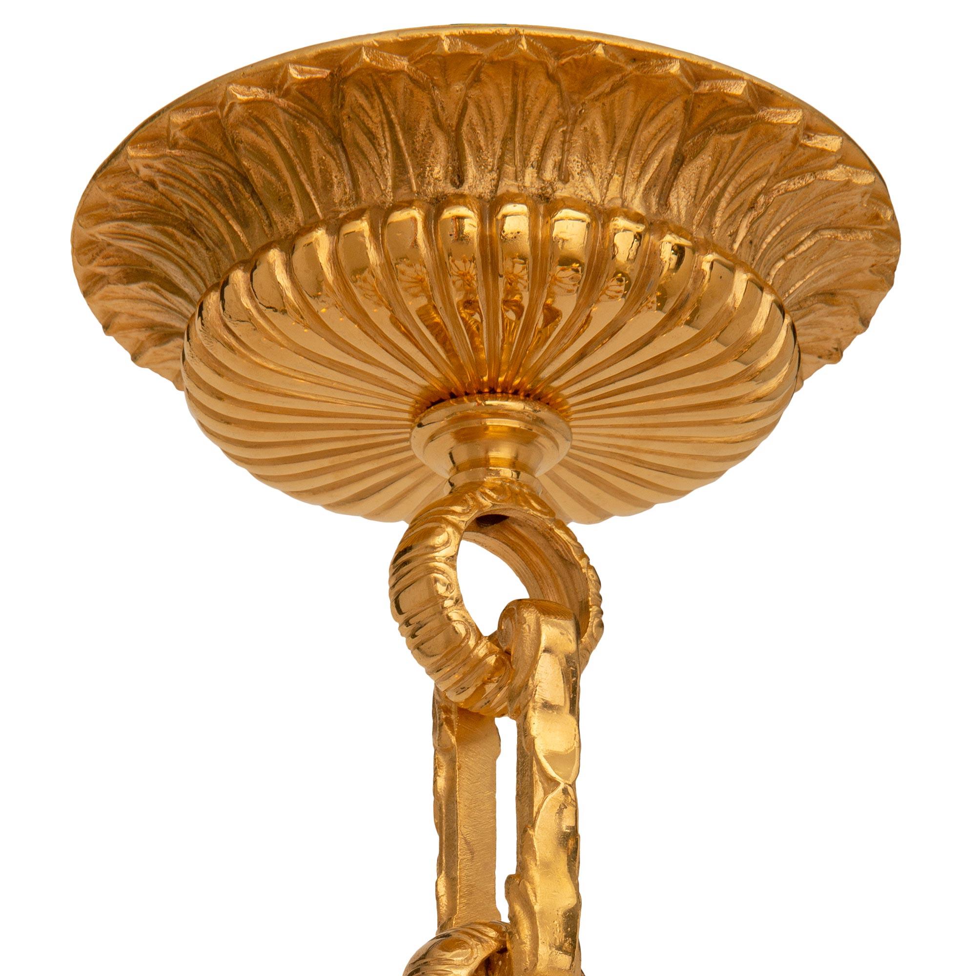 Français Lustre en bronze doré Louis XIV du 19ème siècle en vente