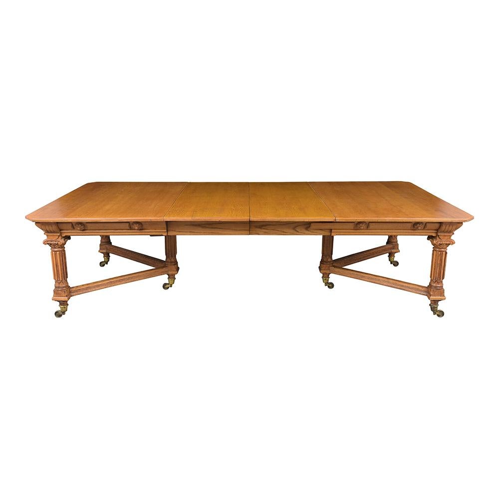 A remarkable Circa 1840’s French Dining Table in great condition. This unique table is made out of solid oak wood stained in a golden oak color, an extendable top mechanism, and two leaves that were later added made of solid oak wood as well. This