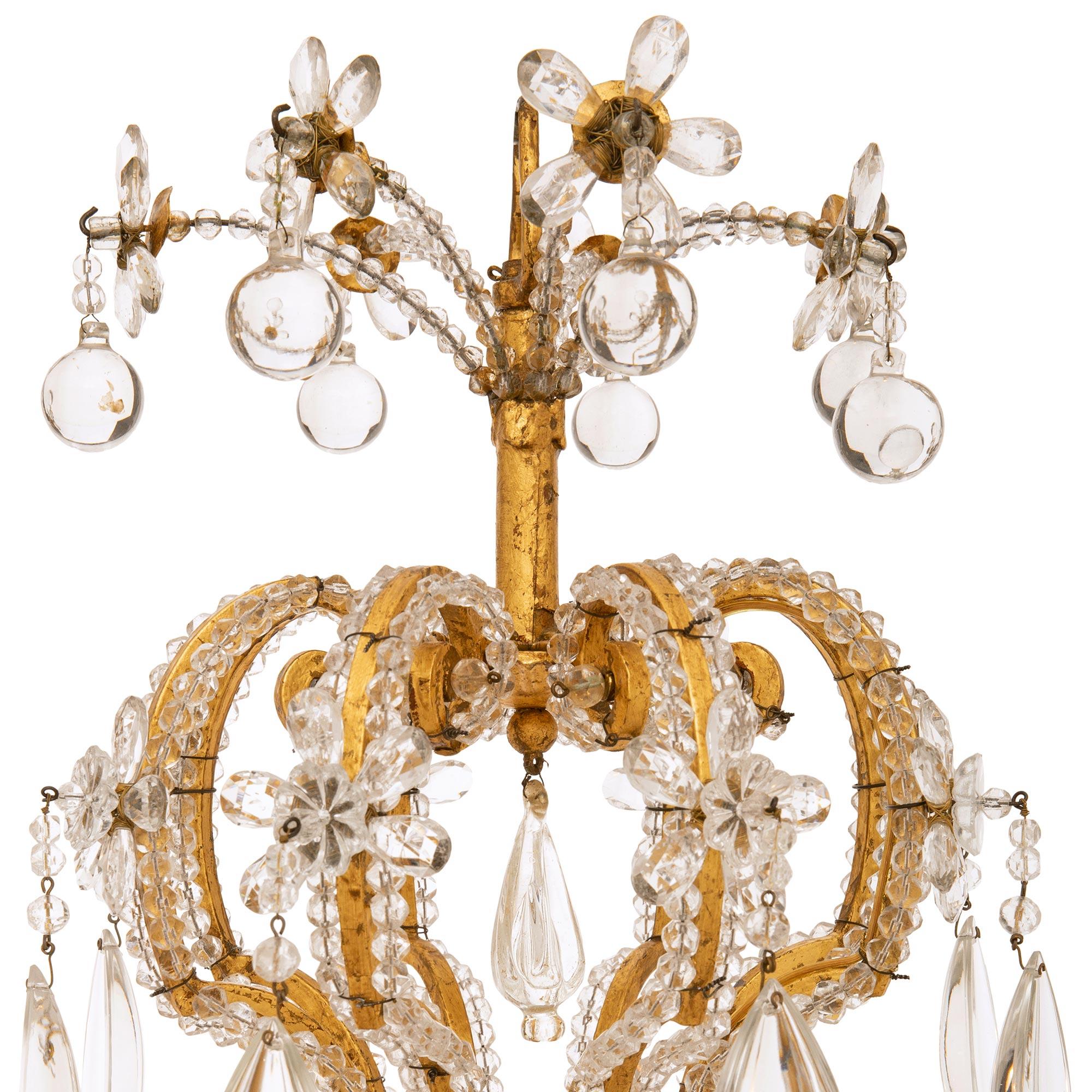 French 19th century Louis XV st. Gilt Metal and cut Glass chandelier In Good Condition For Sale In West Palm Beach, FL